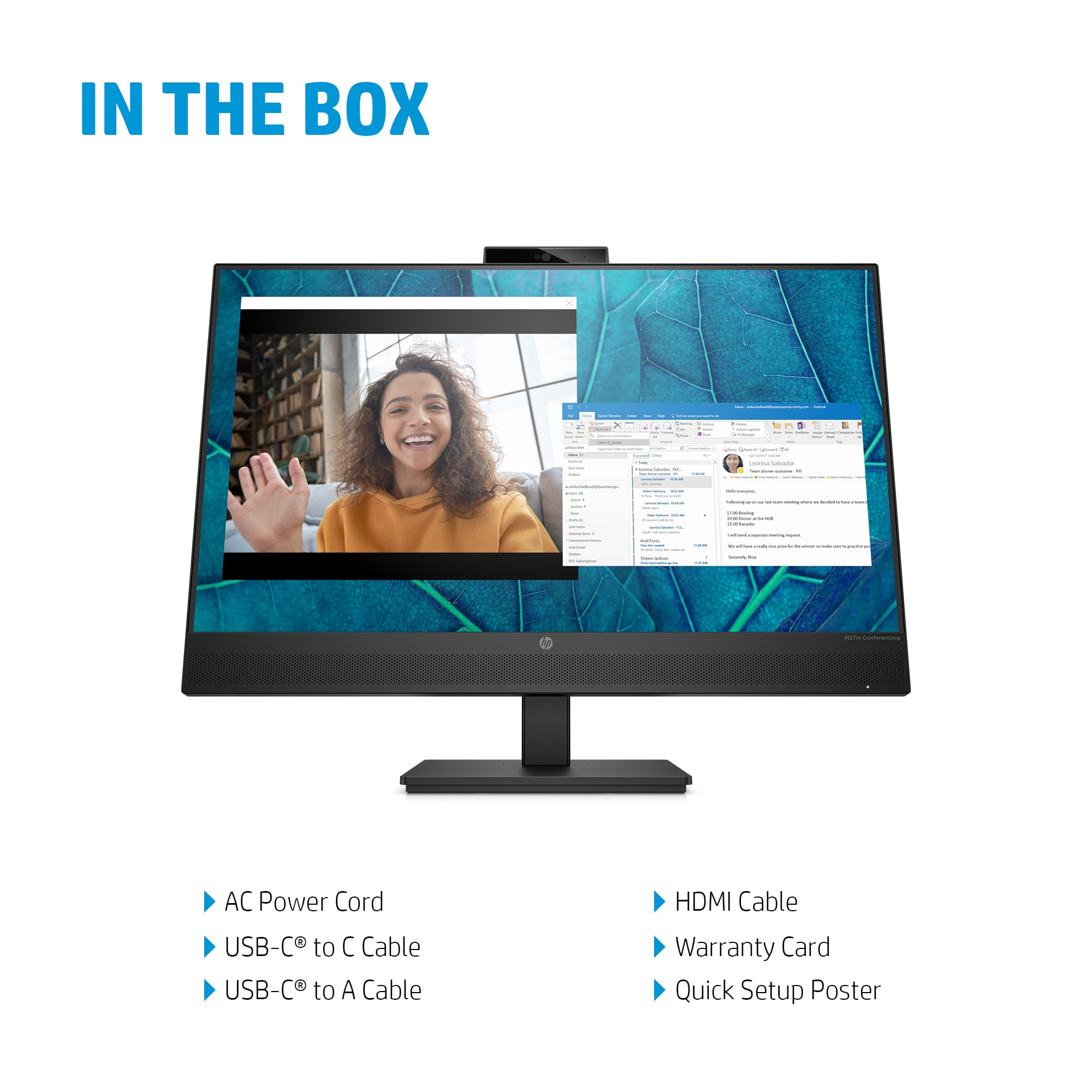El monitor muestra una videollamada con una mujer sonriendo y una vista de la bandeja de entrada.