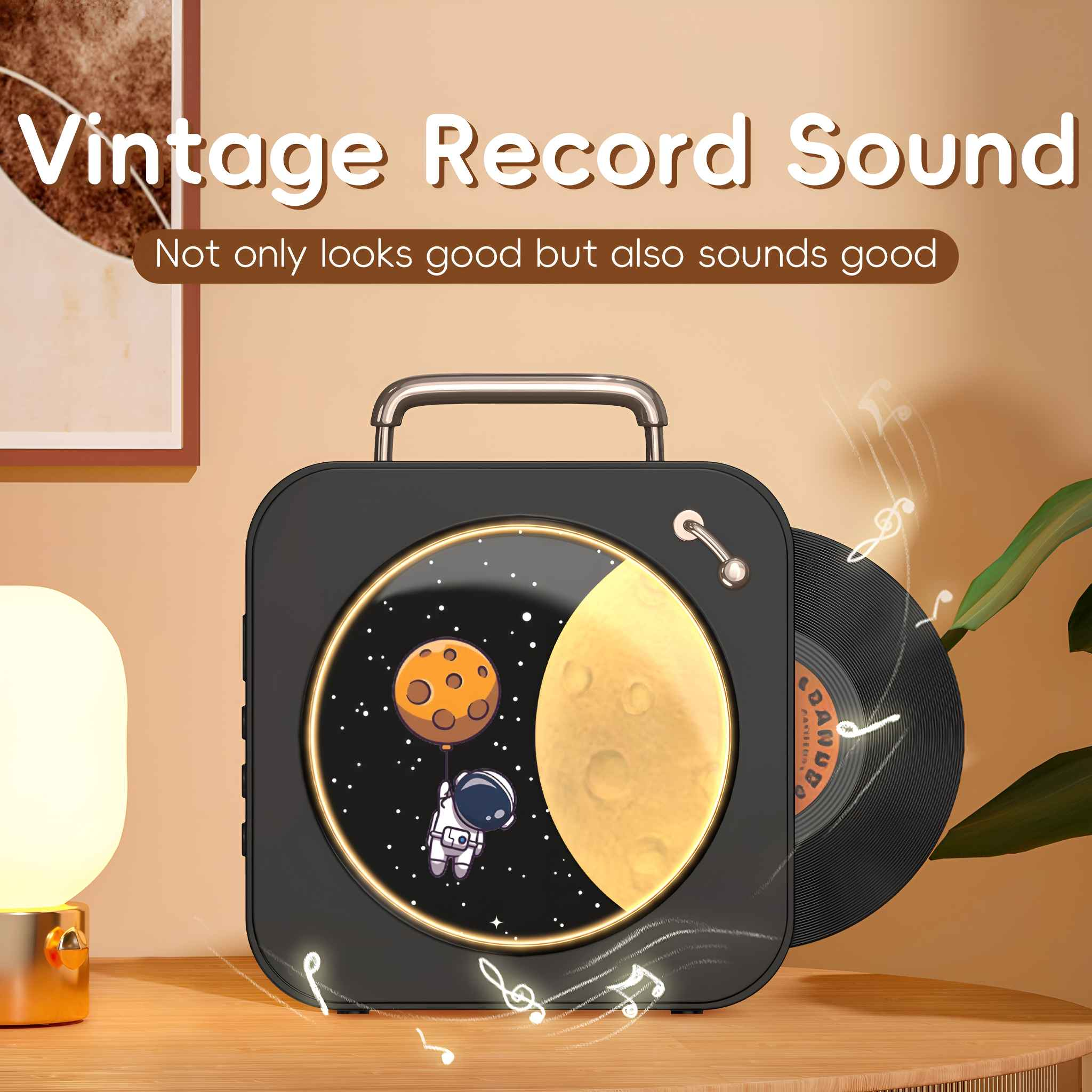 Ein schwarzer Lautsprecher hat einen Vintage-Plattensound. Er steht auf einem Tisch. Ein Cartoon-Astronaut ist auf der Vorderseite. Noten werden angezeigt.