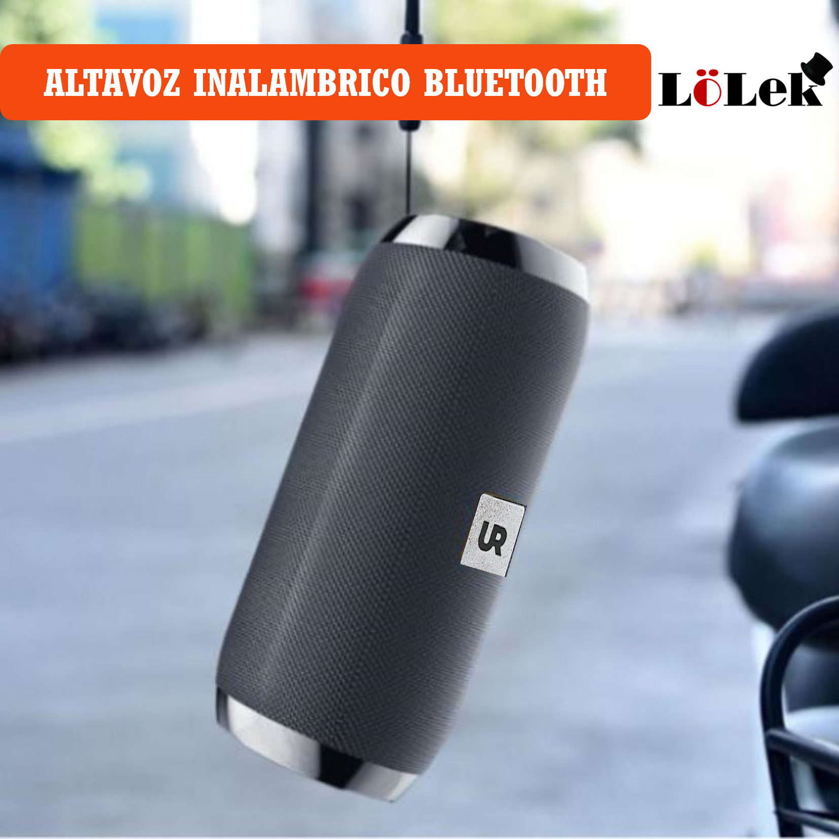 Un altavoz negro colgado de una cuerda.