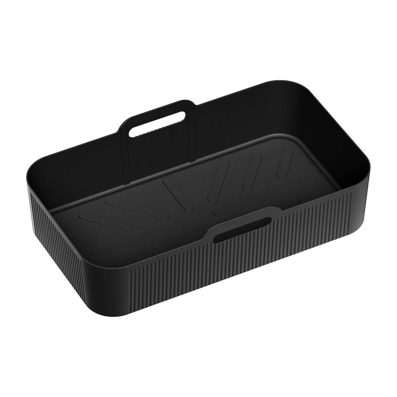 Schwarze rechteckige Airfryer-Form mit Griff und Rippen.