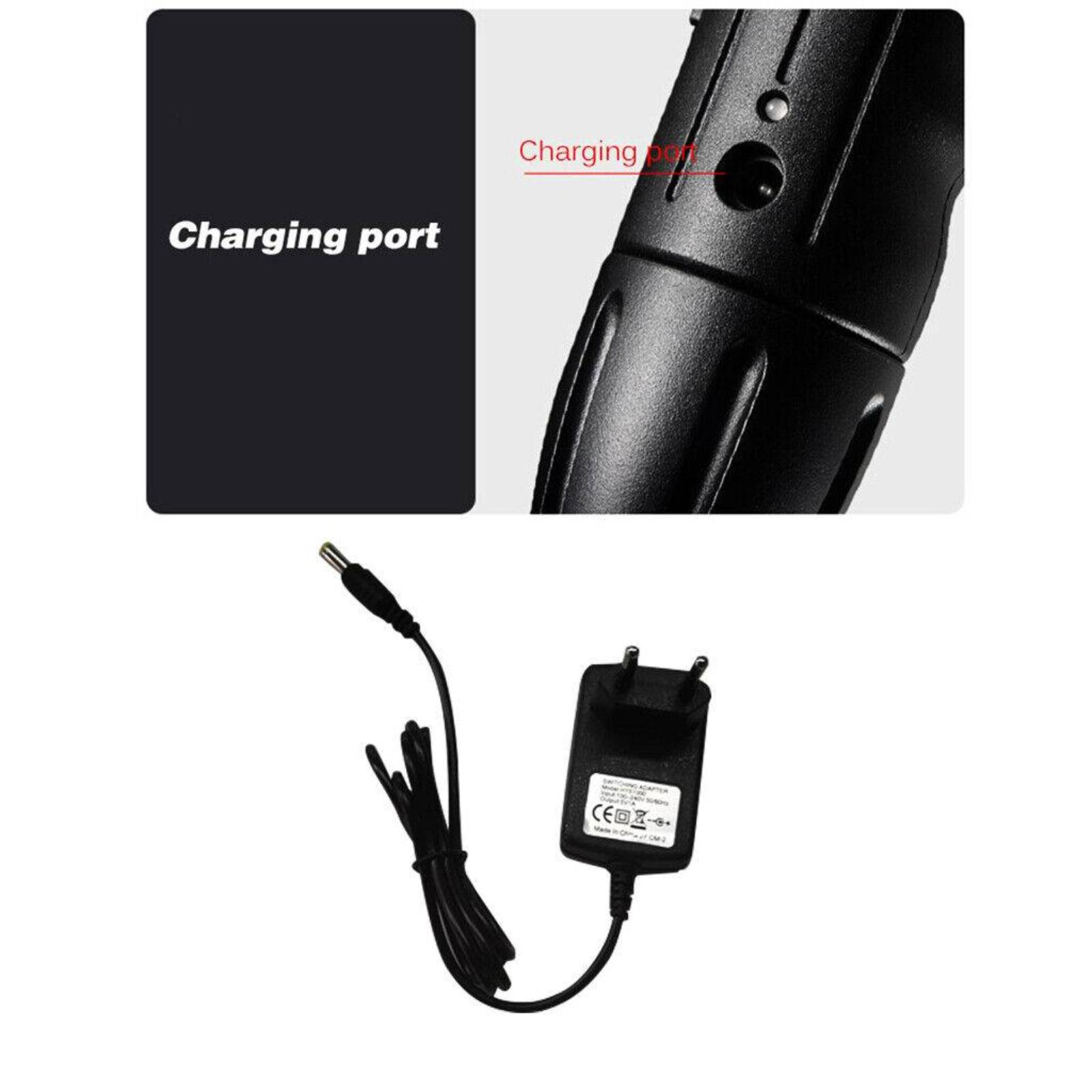 Nahaufnahme eines schwarzen Ladeanschlusses und eines schwarzen Ladeadapters mit Kabel.