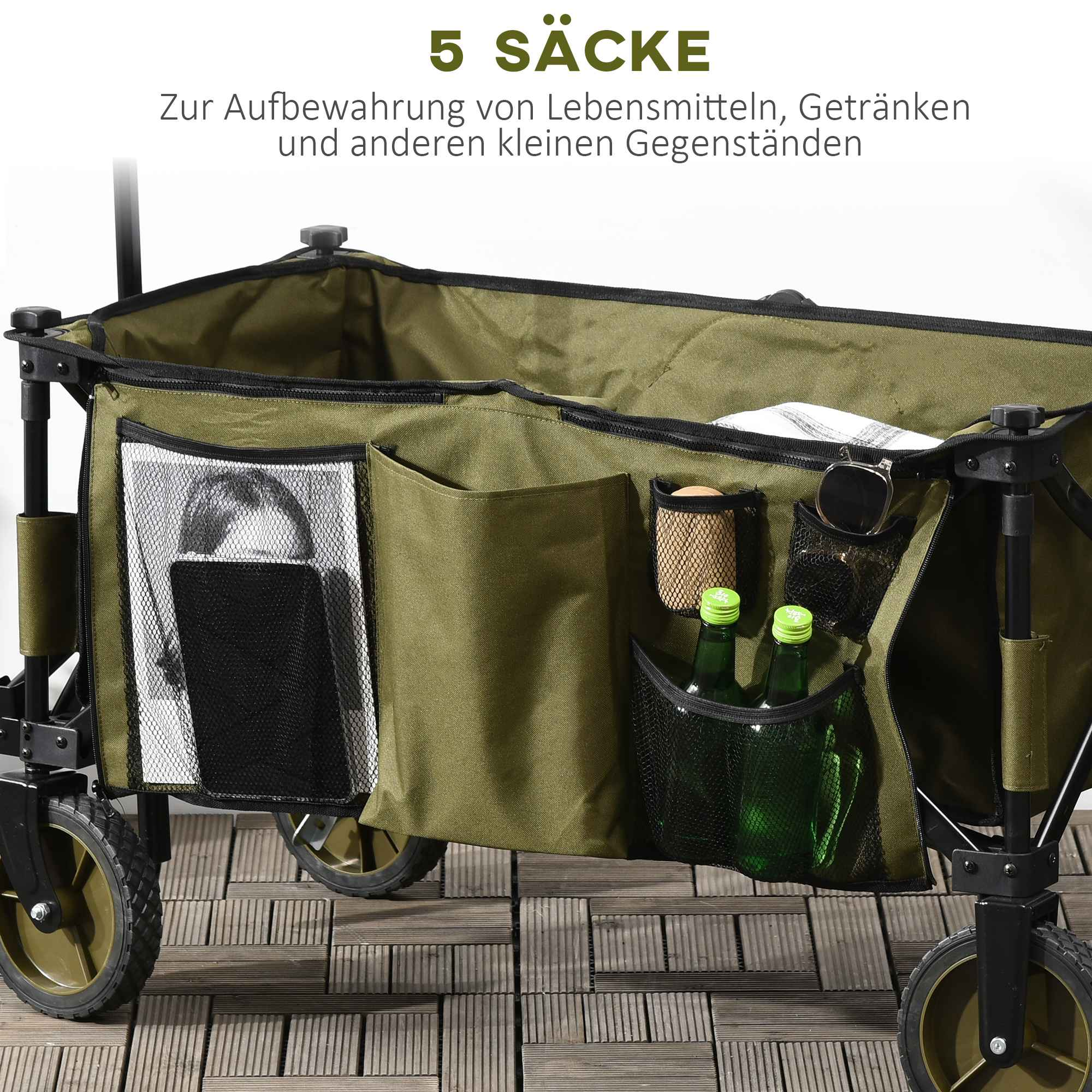 Nahaufnahme eines grünen Transportwagens mit mehreren Aufbewahrungstaschen. Die Taschen enthalten Gegenstände wie eine Zeitschrift.