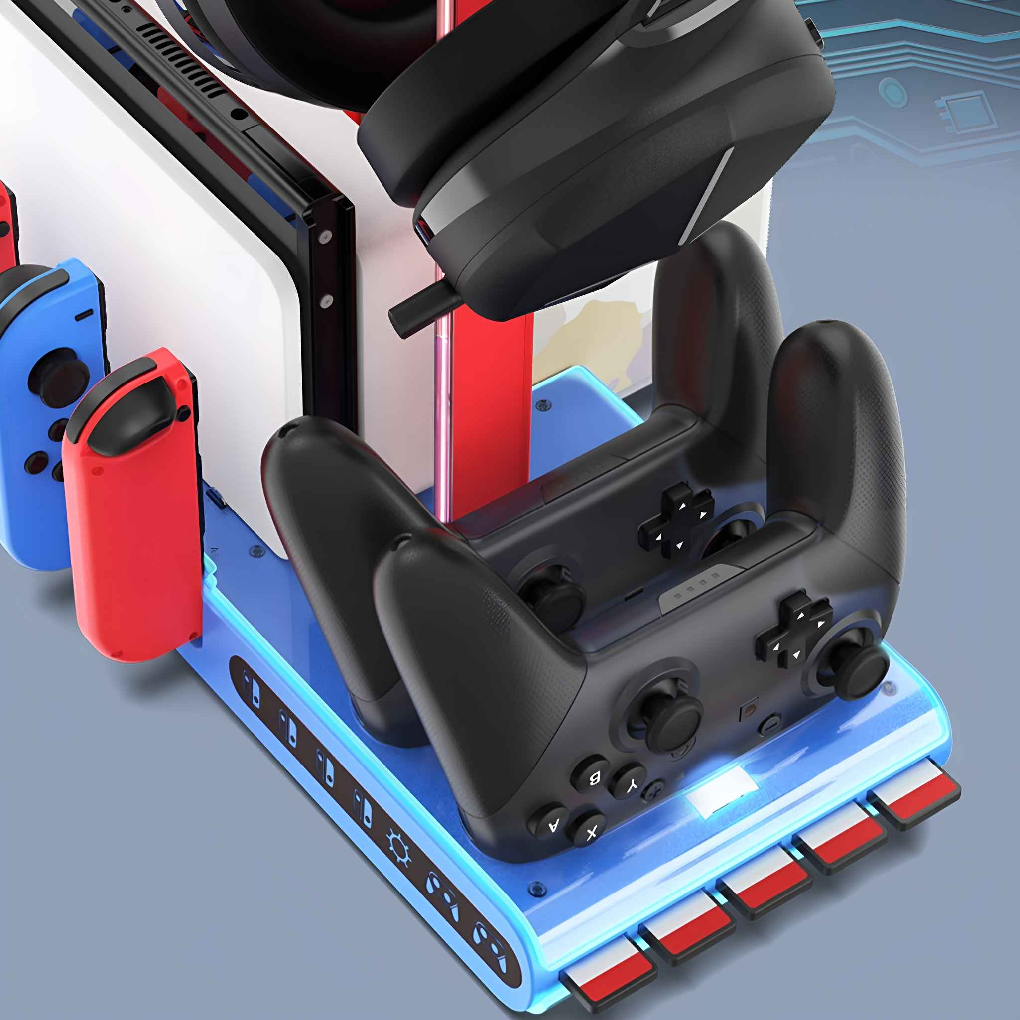 Gaming-Zubehörständer mit Controllern, Headsets und Spielkassetten auf einer grauen Oberfläche.