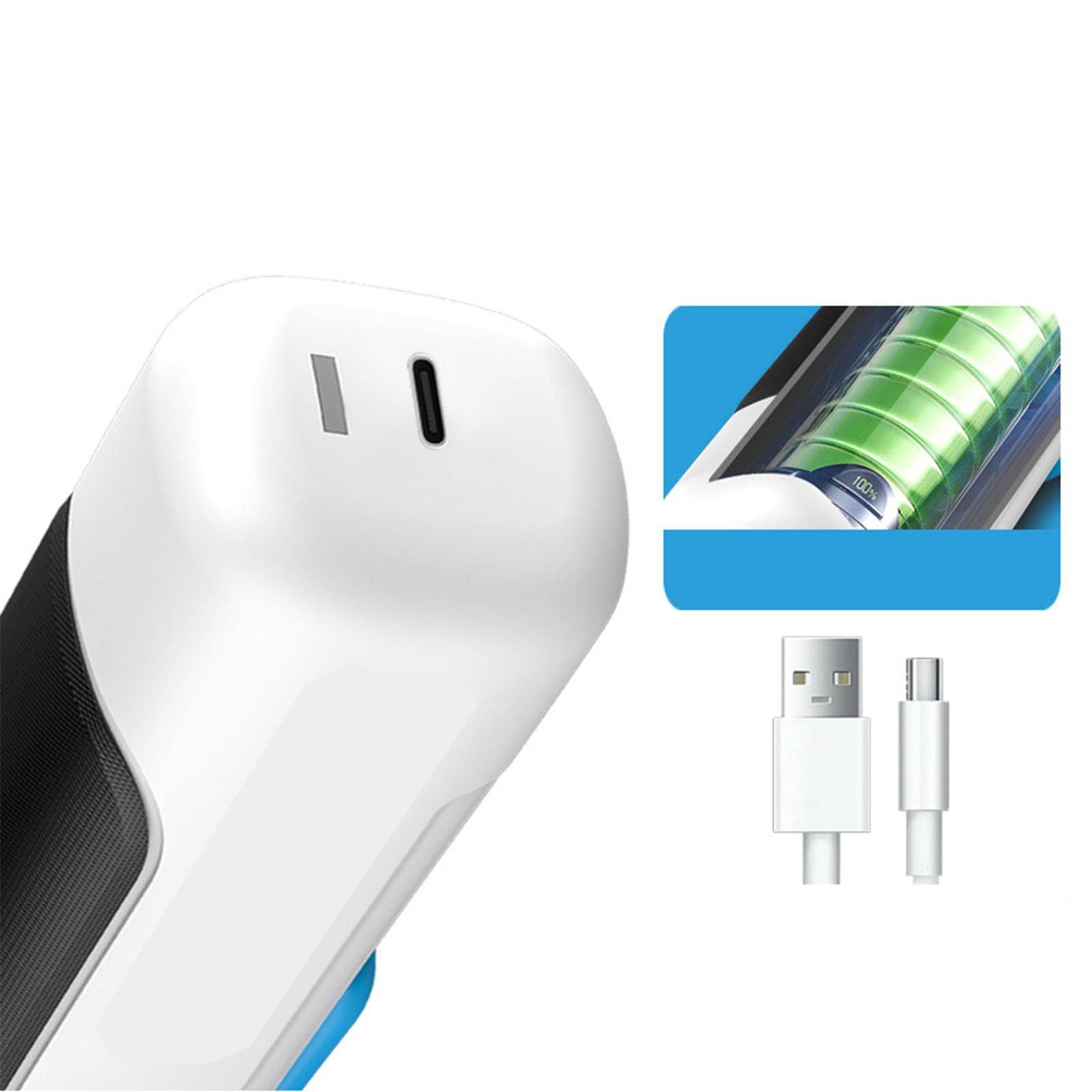 Nahaufnahme eines weißen und schwarzen Geräts mit blauem Knopf. Eine Batterieanzeige wird gezeigt.