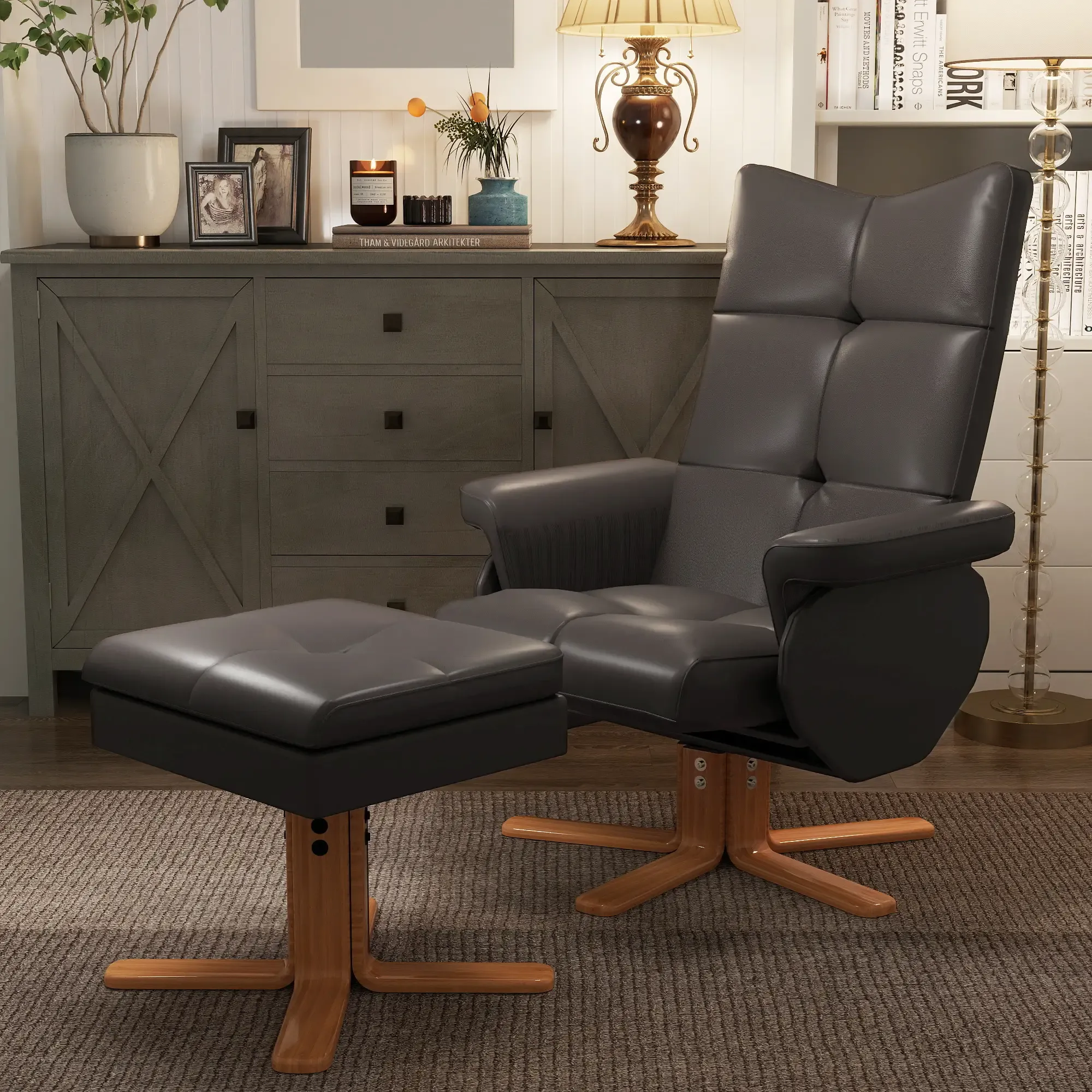Ein grauer Relaxsessel mit Fußstütze in einem Wohnzimmer.
