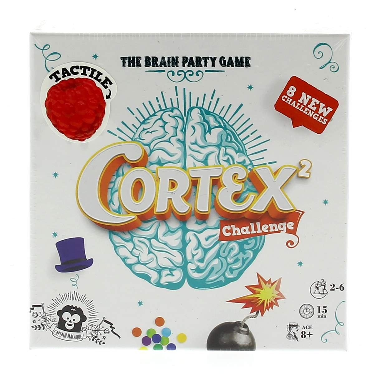 Boîte du jeu Cortex Challenge. Elle présente une image de cerveau, une framboise, un chapeau et d'autres graphiques.