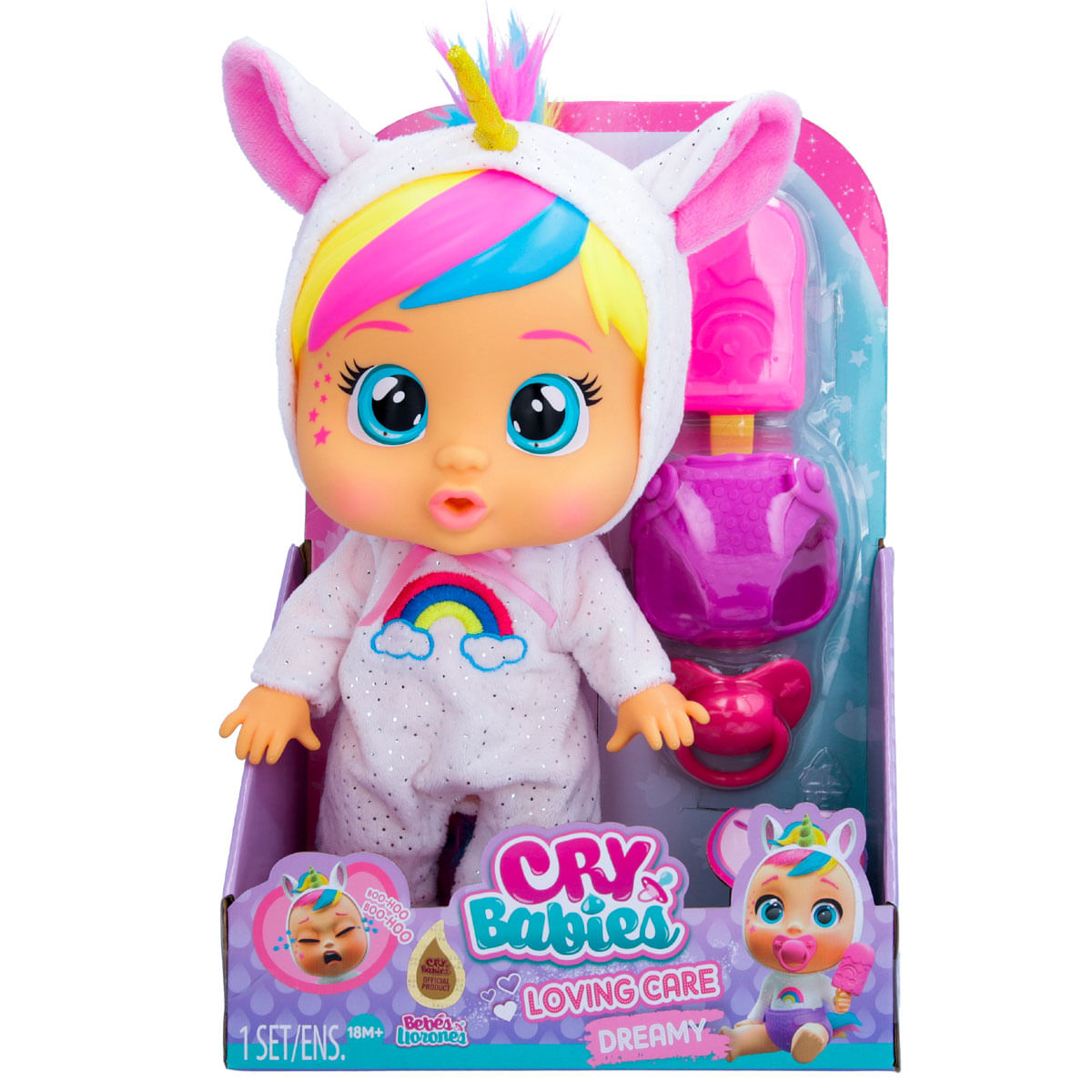 Muñeca Cry Babies Loving Care con un disfraz de unicornio, con accesorios en el embalaje.