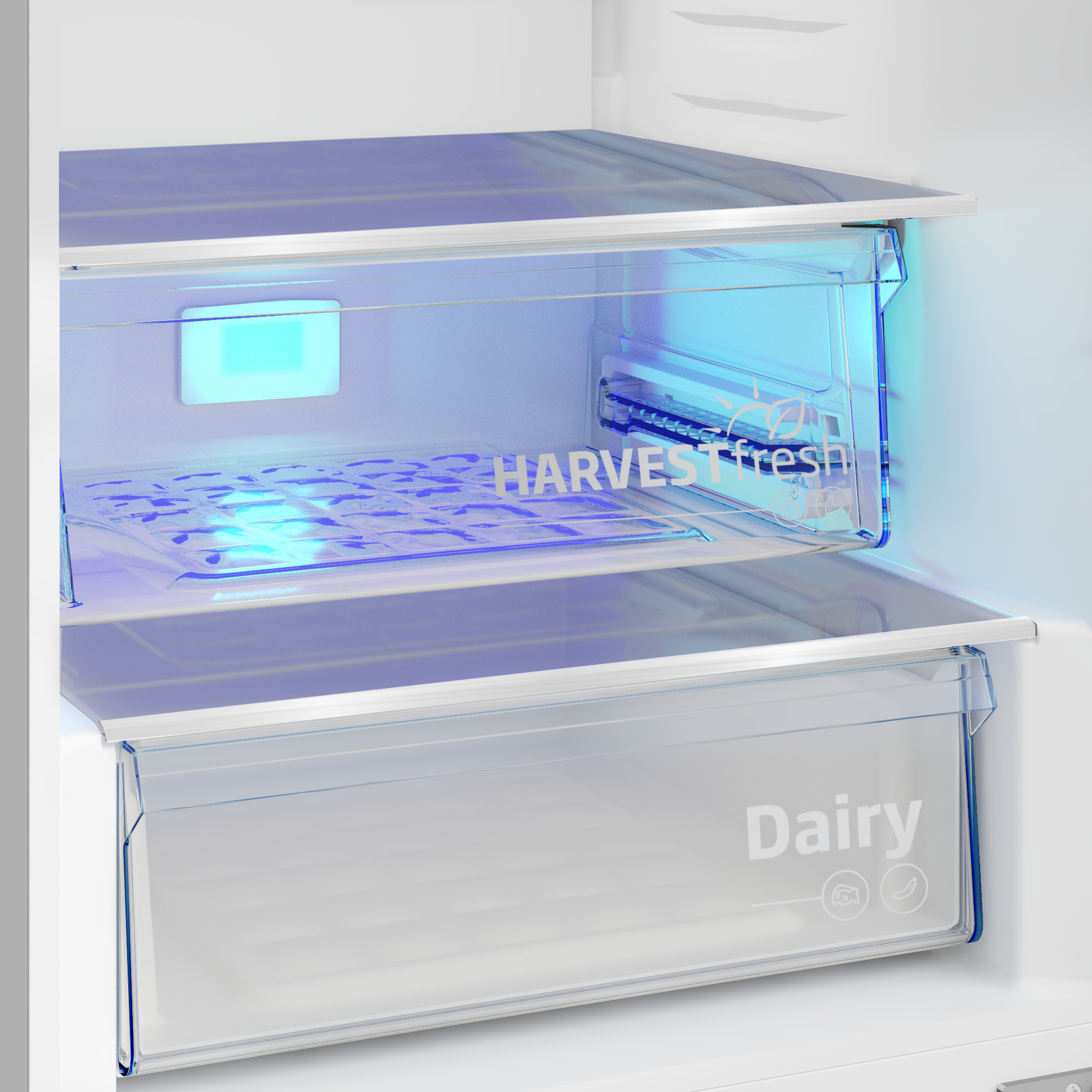 Primer plano de cajones de refrigerador. El cajón superior tiene una etiqueta HarvestFresh, el inferior una etiqueta Dairy.