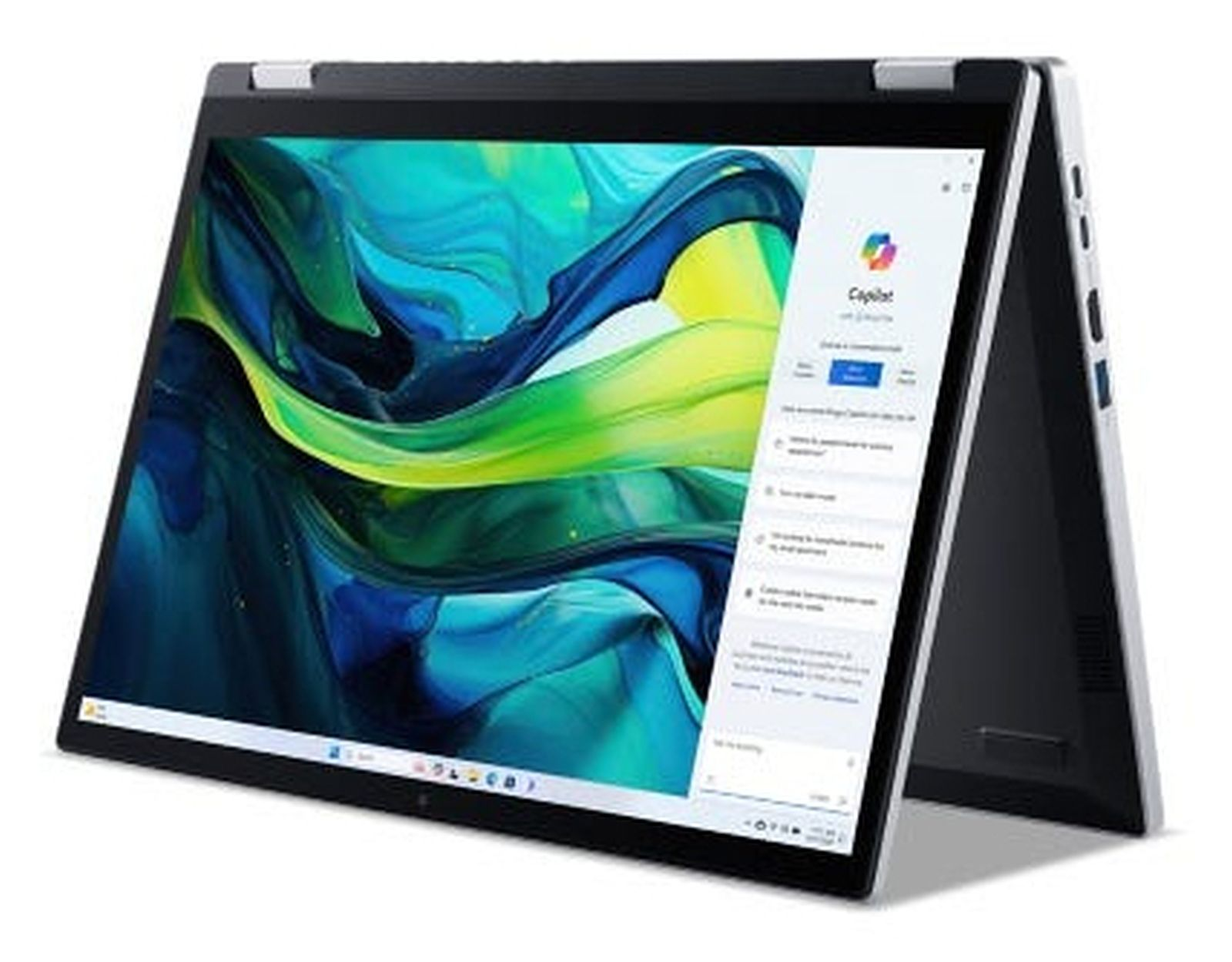 Laptop Acer otwarty pod kątem, wyświetlający ekran z abstrakcyjnymi kolorami i interfejsem Copilot.