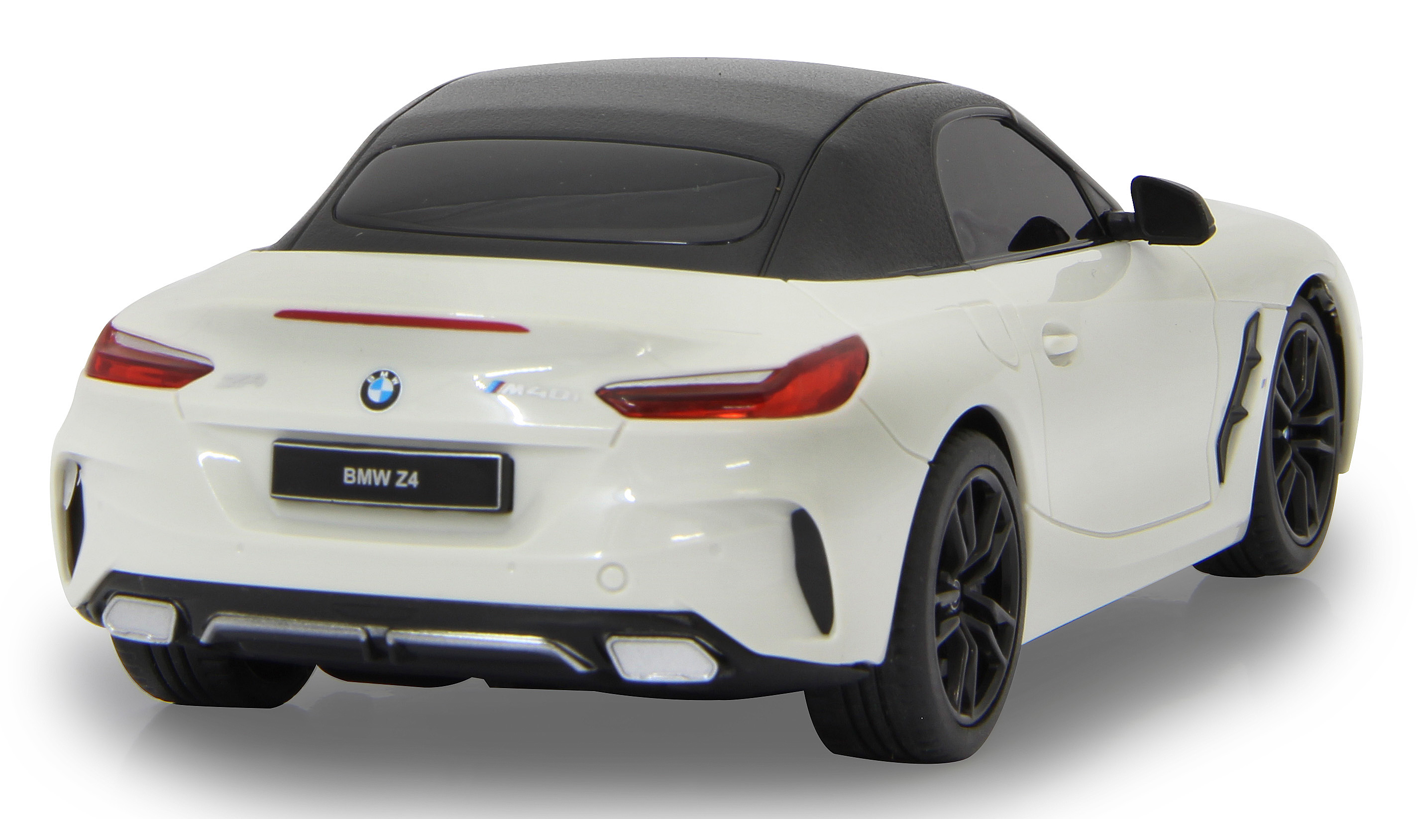 Weißes BMW Z4 Modellauto. Schwarzes Dach, Räder und Details. Rückansicht.