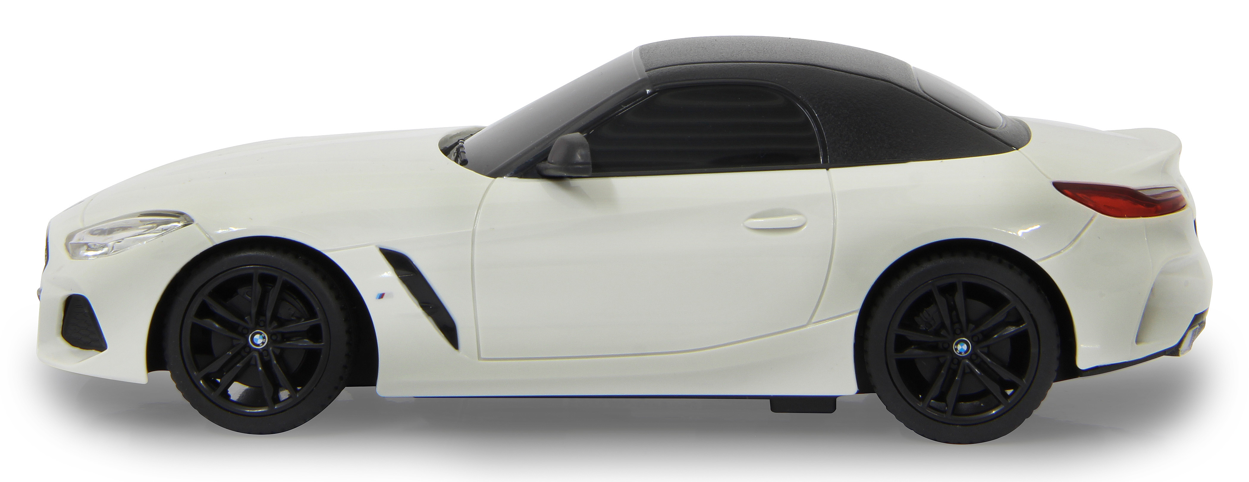 Weißes BMW Z4 Cabrio mit schwarzem Dach und schwarzen Rädern, Seitenansicht.