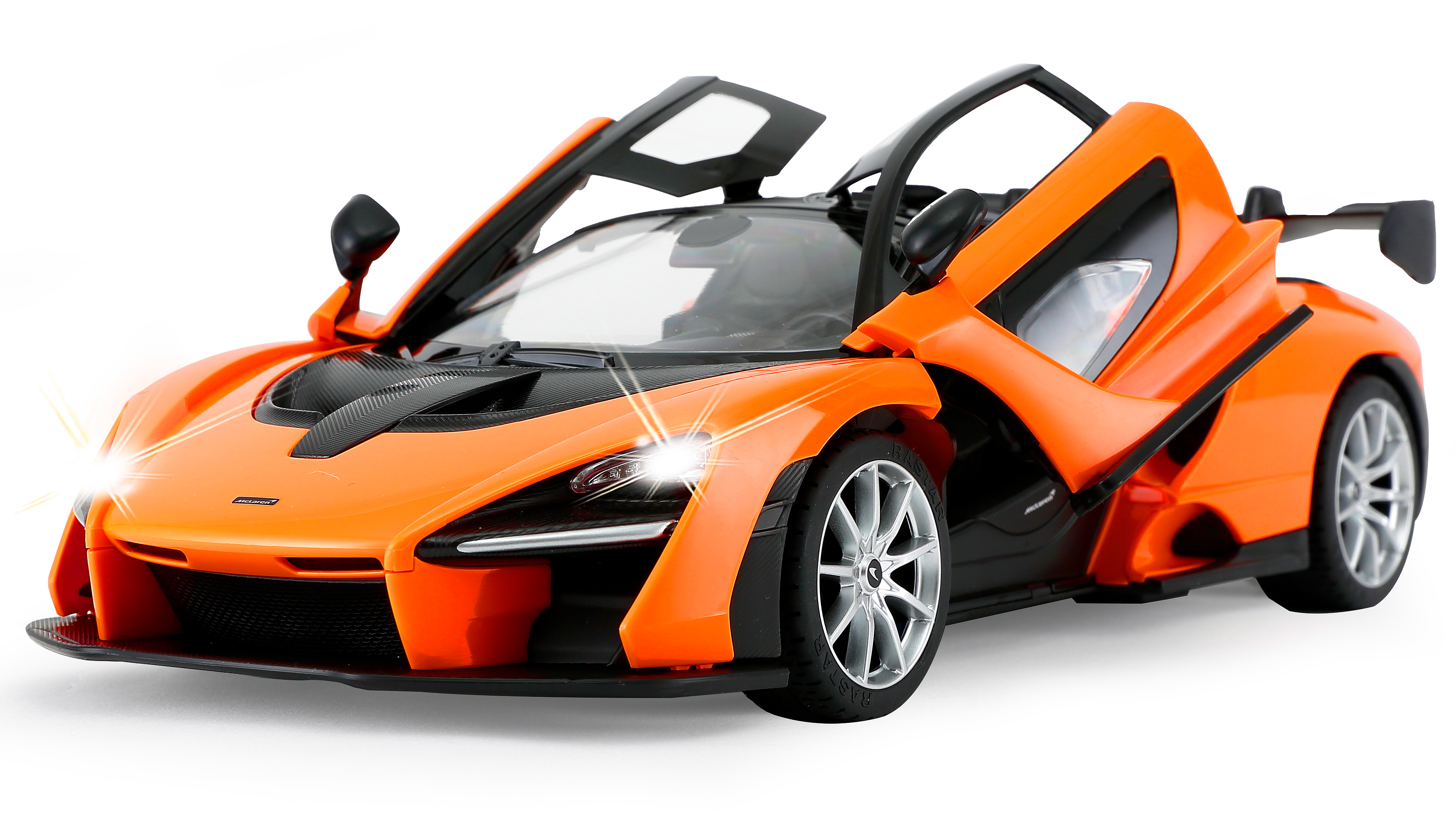 Hellorange McLaren Senna Modellauto. Türen offen, Scheinwerfer an und ein schwarzes Dach.