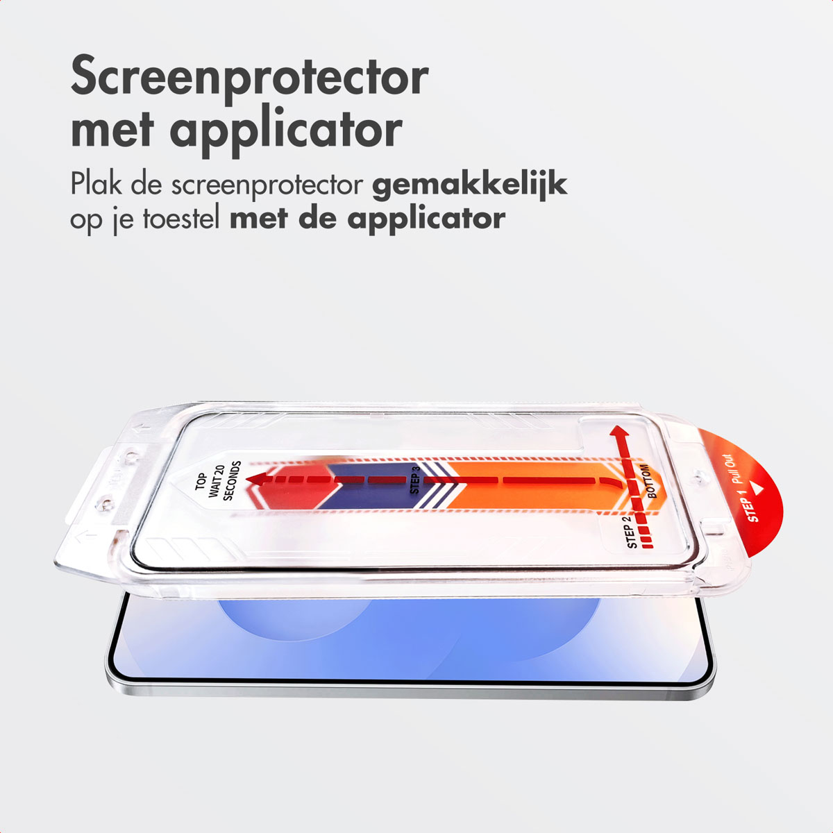 Telefono e protezione. Un applicatore in plastica trasparente è posizionato sopra il telefono. Lo schermo è multicolore.