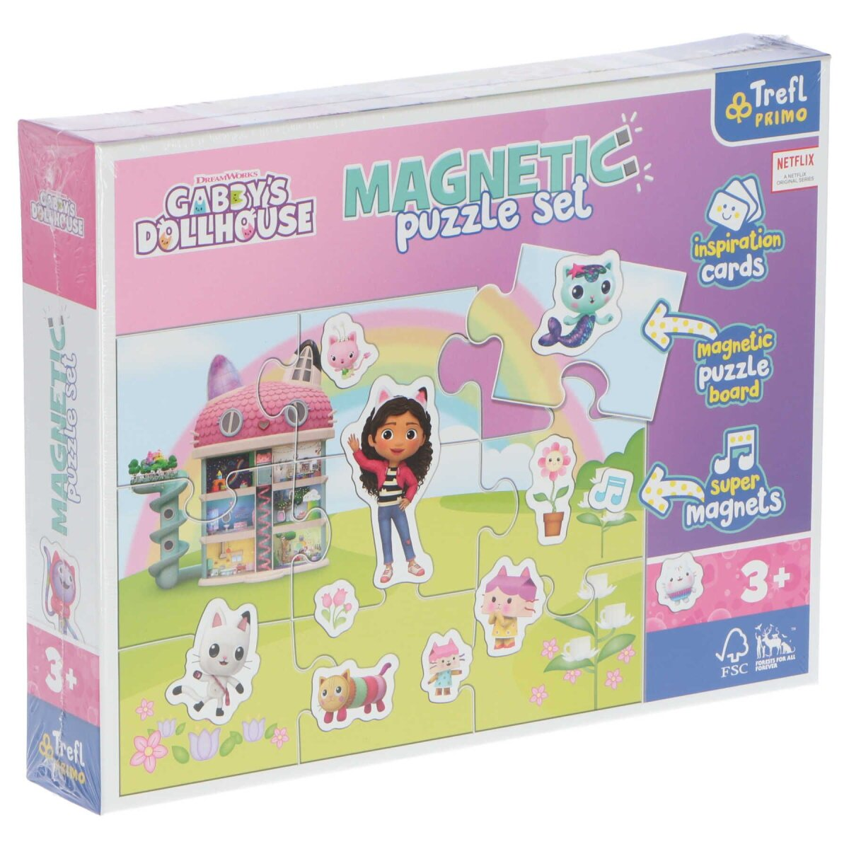 Pudełko z magnetyczną układanką Gabby's Dollhouse na białej powierzchni. Pudełko ma zdjęcia postaci.