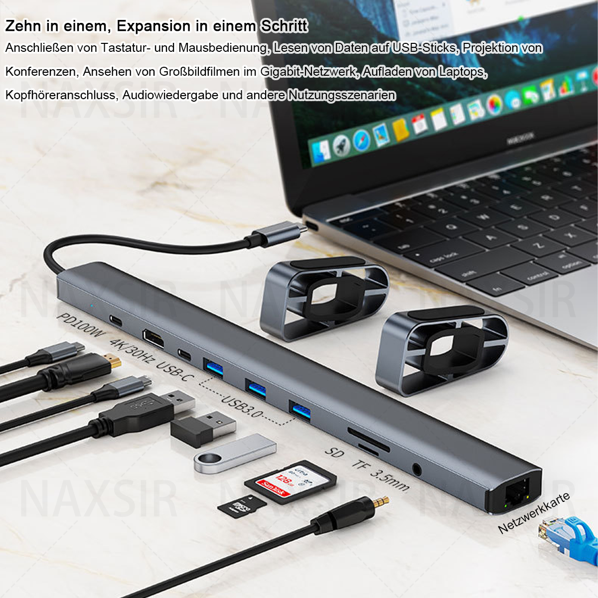Ein Laptop, ein USB-Hub und angeschlossene Peripheriegeräte. Enthält Anschlüsse für USB, SD und verschiedene Kabel.