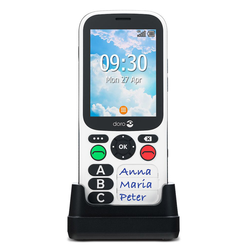 Telefono bianco su supporto. Lo schermo mostra ora, data e nomi dei contatti.