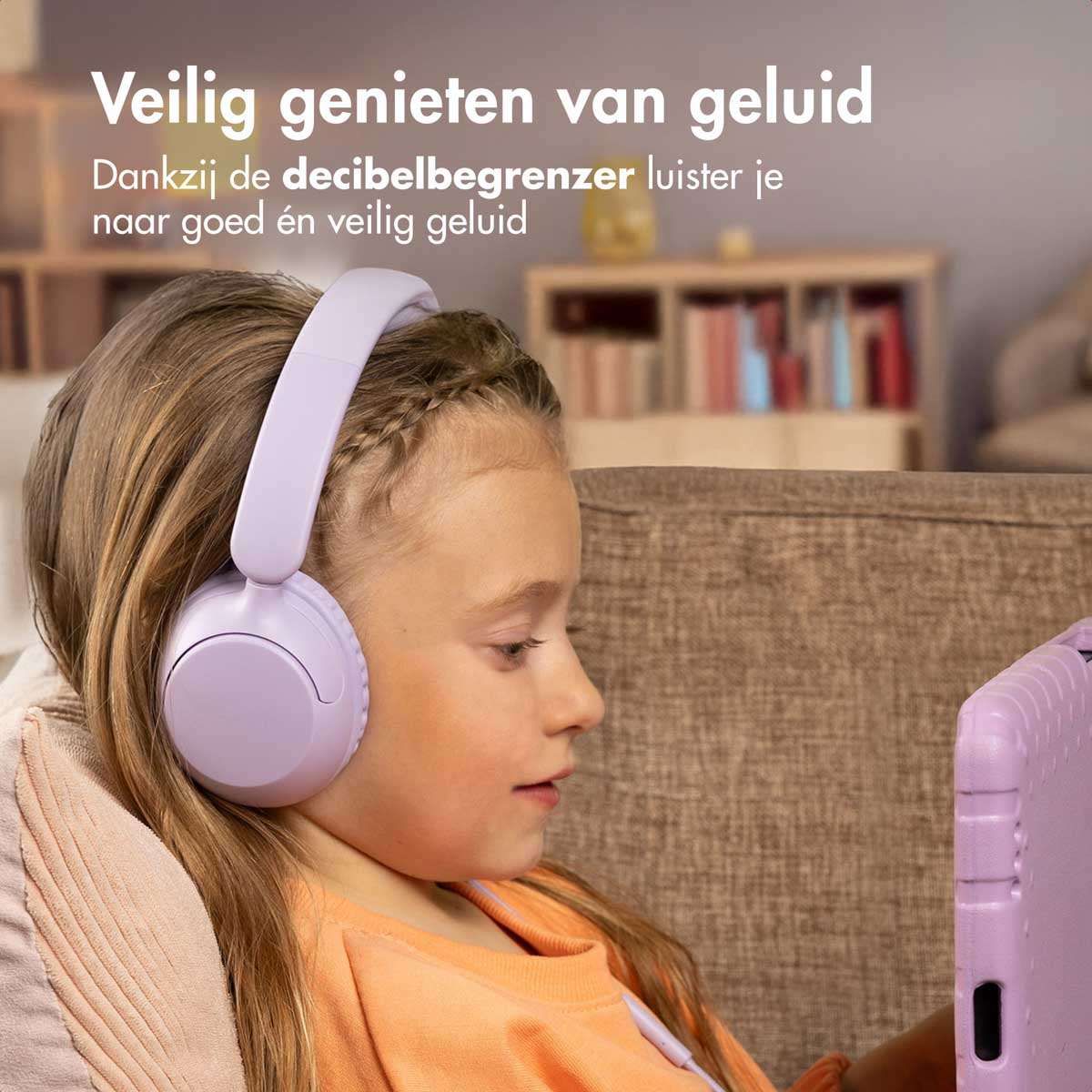 A girl wearing purple headphones watches a tablet. Text: Safe enjoyment of sound, using a decibel limiter.