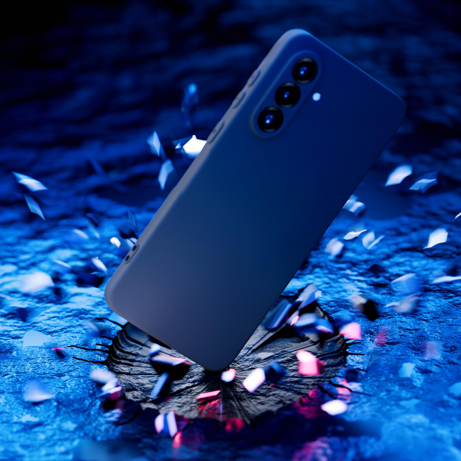 Granatowe etui na telefon przebija powierzchnię. Widoczne są niebieskie i czerwone światła.