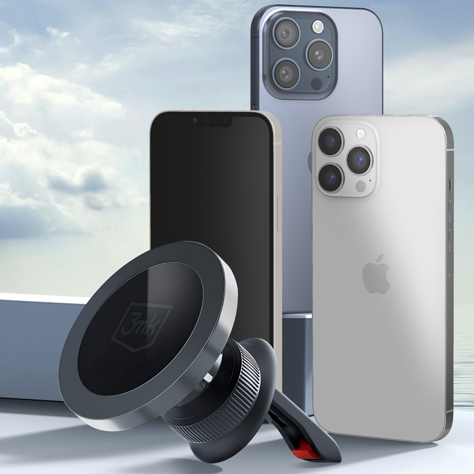 Wiele telefonów i uchwyt samochodowy. Telefony są srebrne, czarne i niebieskie, z tłem nieba.