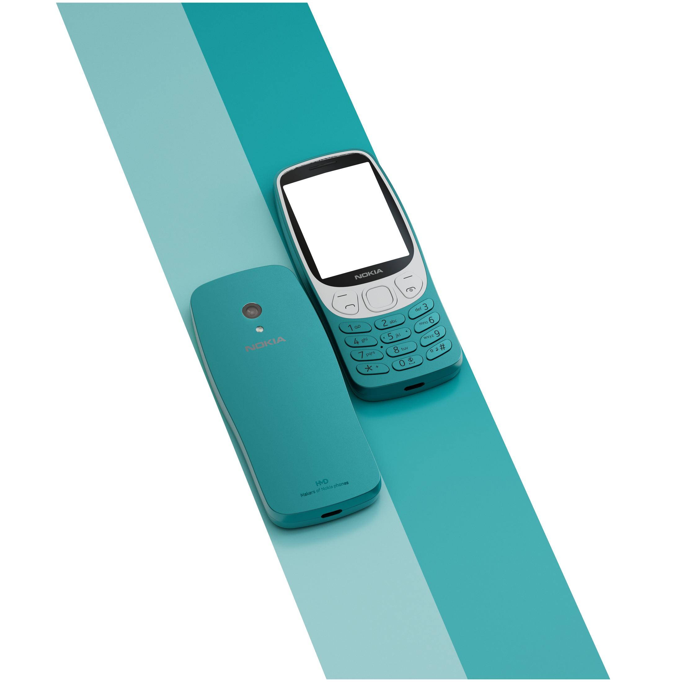 Zwei türkisfarbene Nokia-Telefone. Eines liegt, das andere steht. Beide zeigen die Marke Nokia.