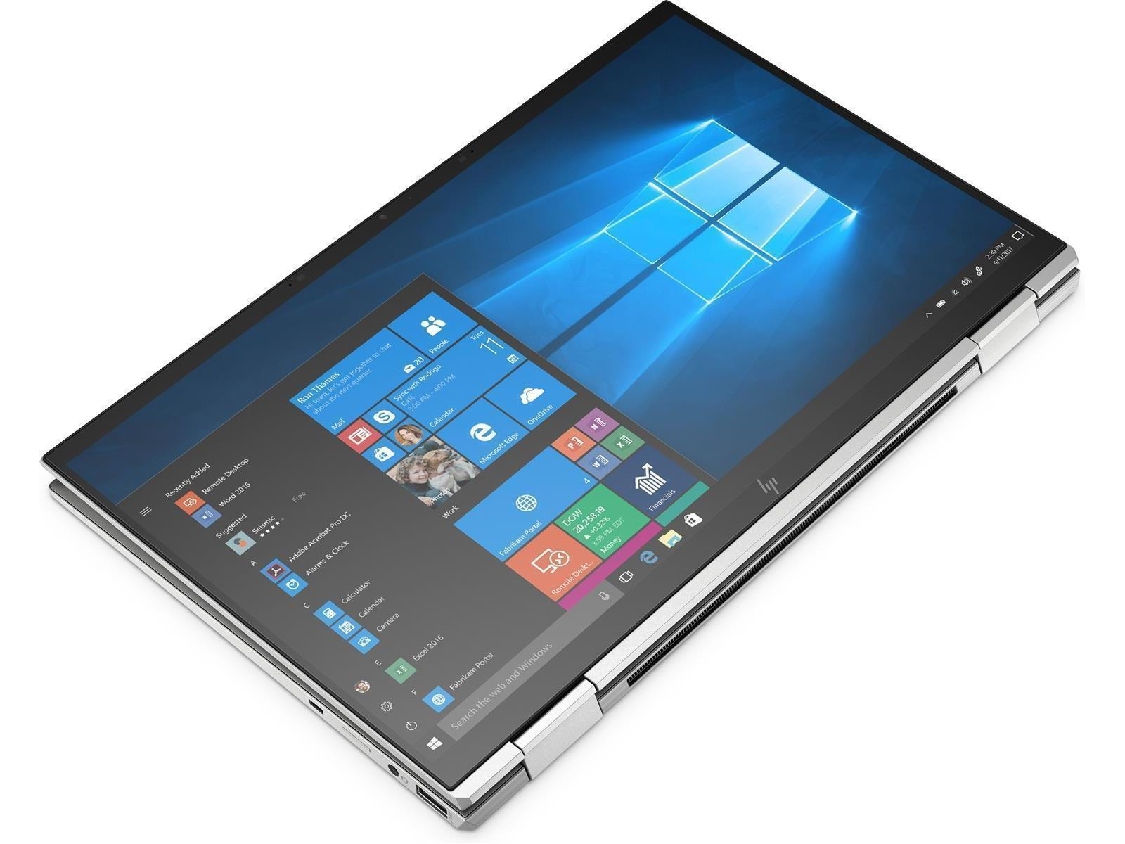 Ein silberner Laptop auf einer weißen Oberfläche. Der Bildschirm zeigt eine Windows-Oberfläche mit verschiedenen App-Symbolen.
