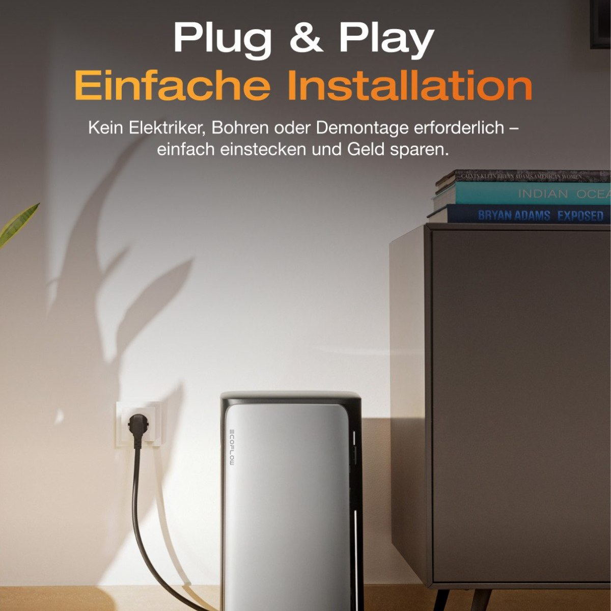 A plug and play setup with a power outlet, a power cable plugged in, and a silver device next to a cabinet.