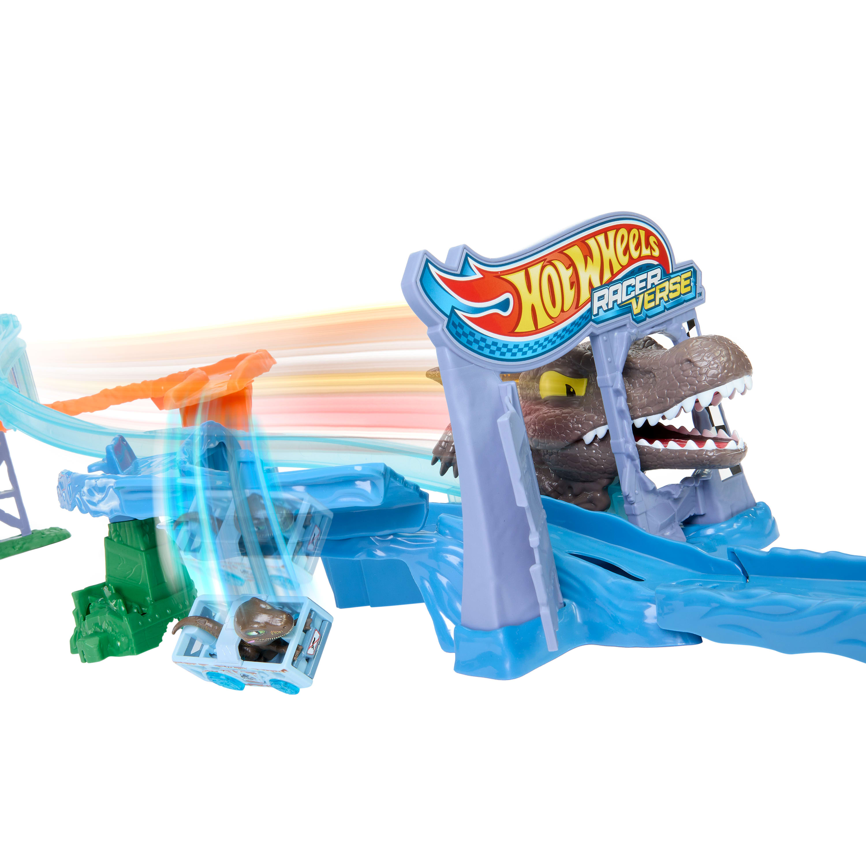 Zestaw torów Hot Wheels. Zabawkowy samochód wystrzeliwuje w kierunku głowy dinozaura. Zestaw ma niebieskie, pomarańczowe i zielone tory.