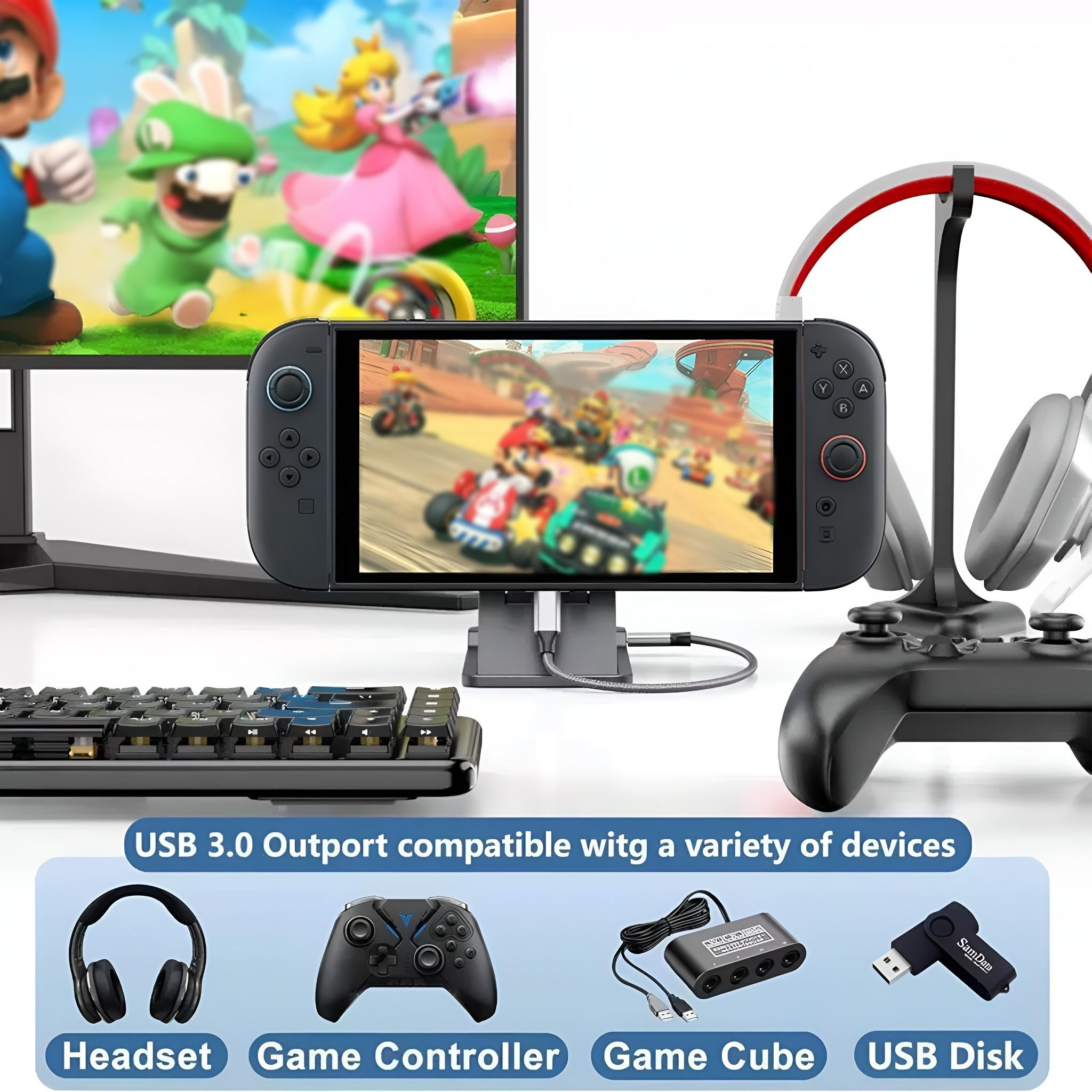 Ein Gaming-Setup mit einer Nintendo Switch, Controllern, Headsets und verschiedenen Geräten.