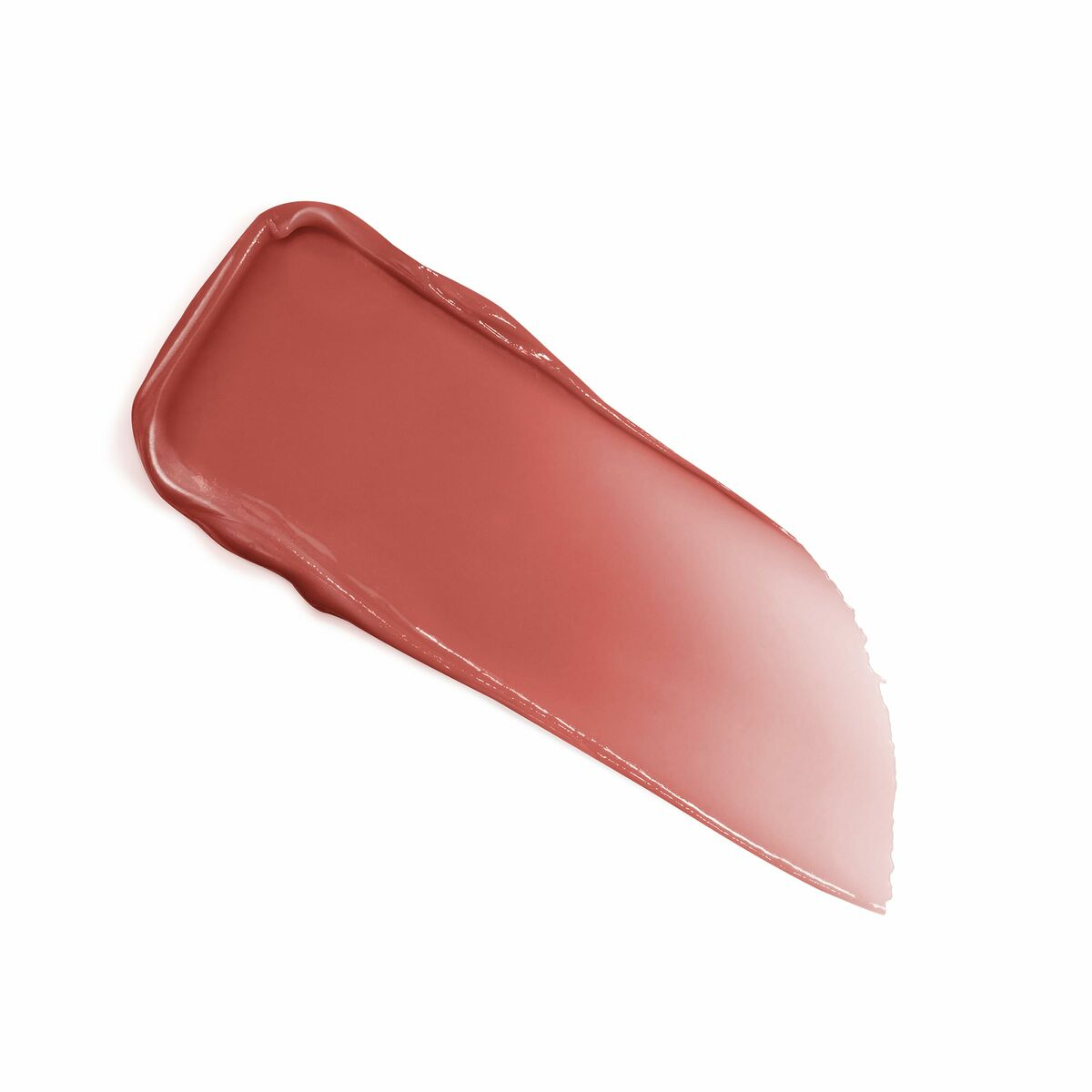 Ein Lippenstift-Abstrich auf weißem Hintergrund. Es hat eine rötlich-rosa Farbe und eine glänzende Textur.