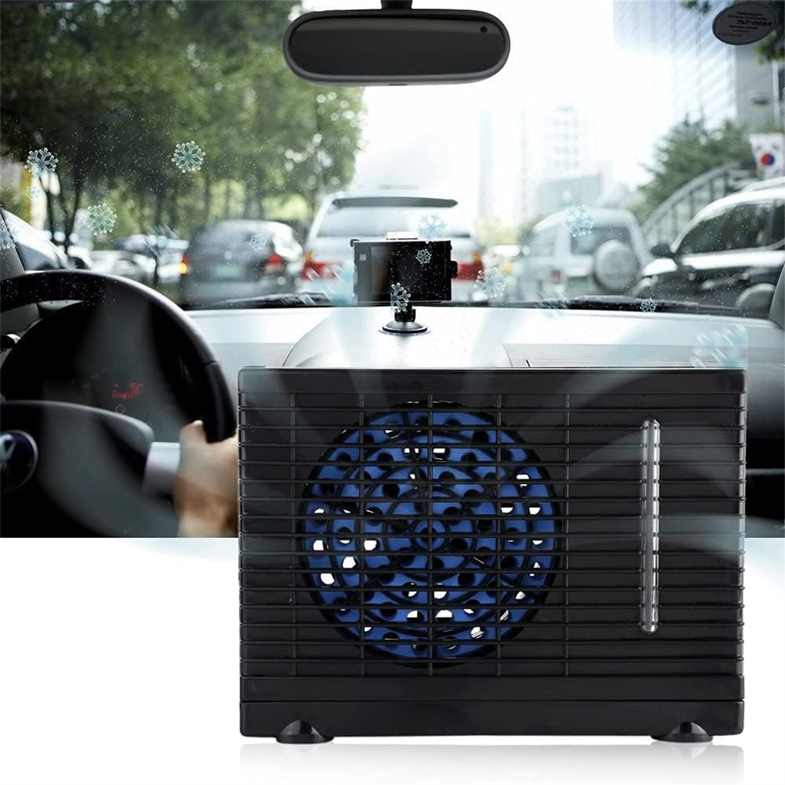 Schwarze Klimaanlage in einem Auto mit Schneeflocken-Overlay. Ein Lenkrad ist sichtbar.