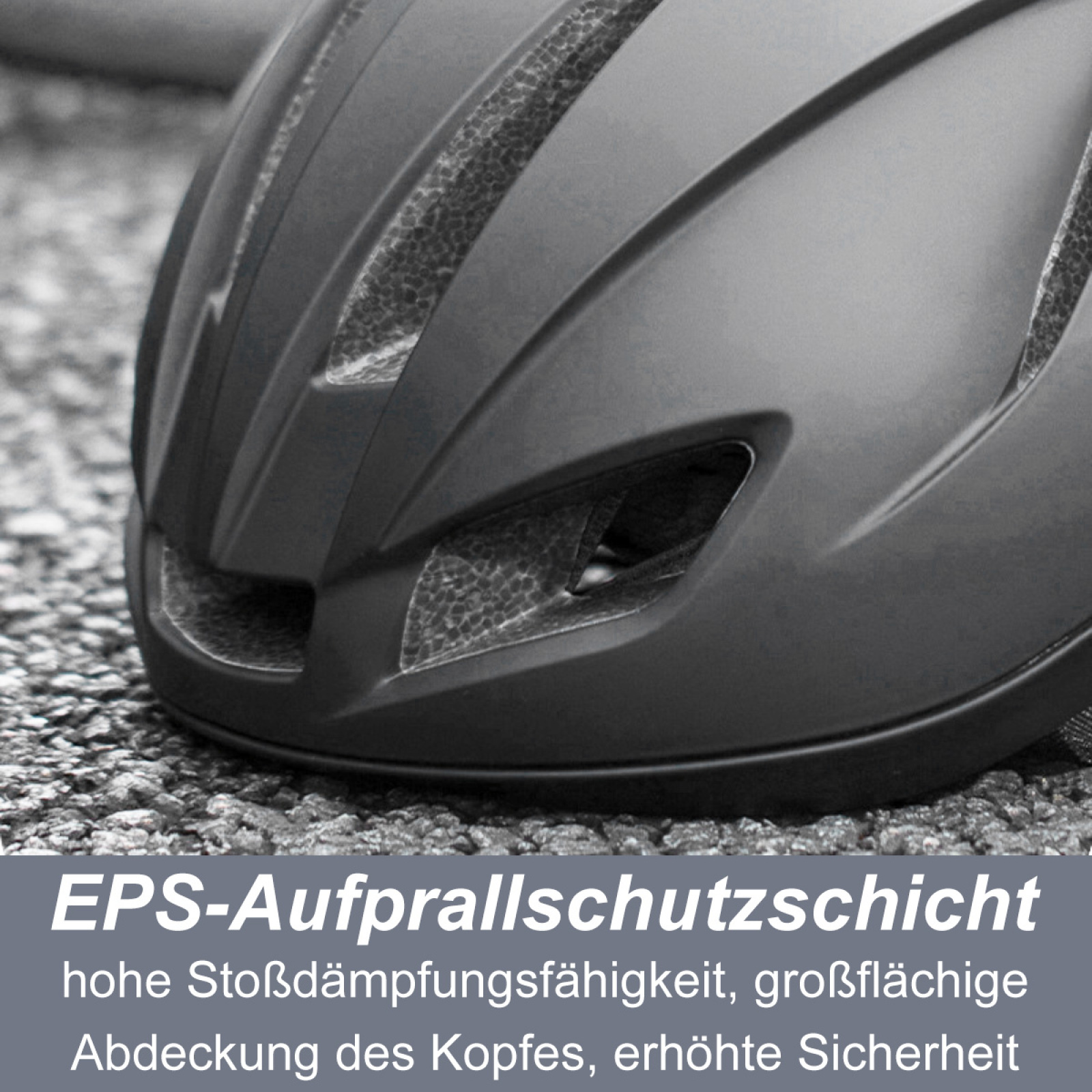 Nahaufnahme eines schwarzen Fahrradhelms. Der Text 'EPS-Aufprallschutzschicht' ist sichtbar.