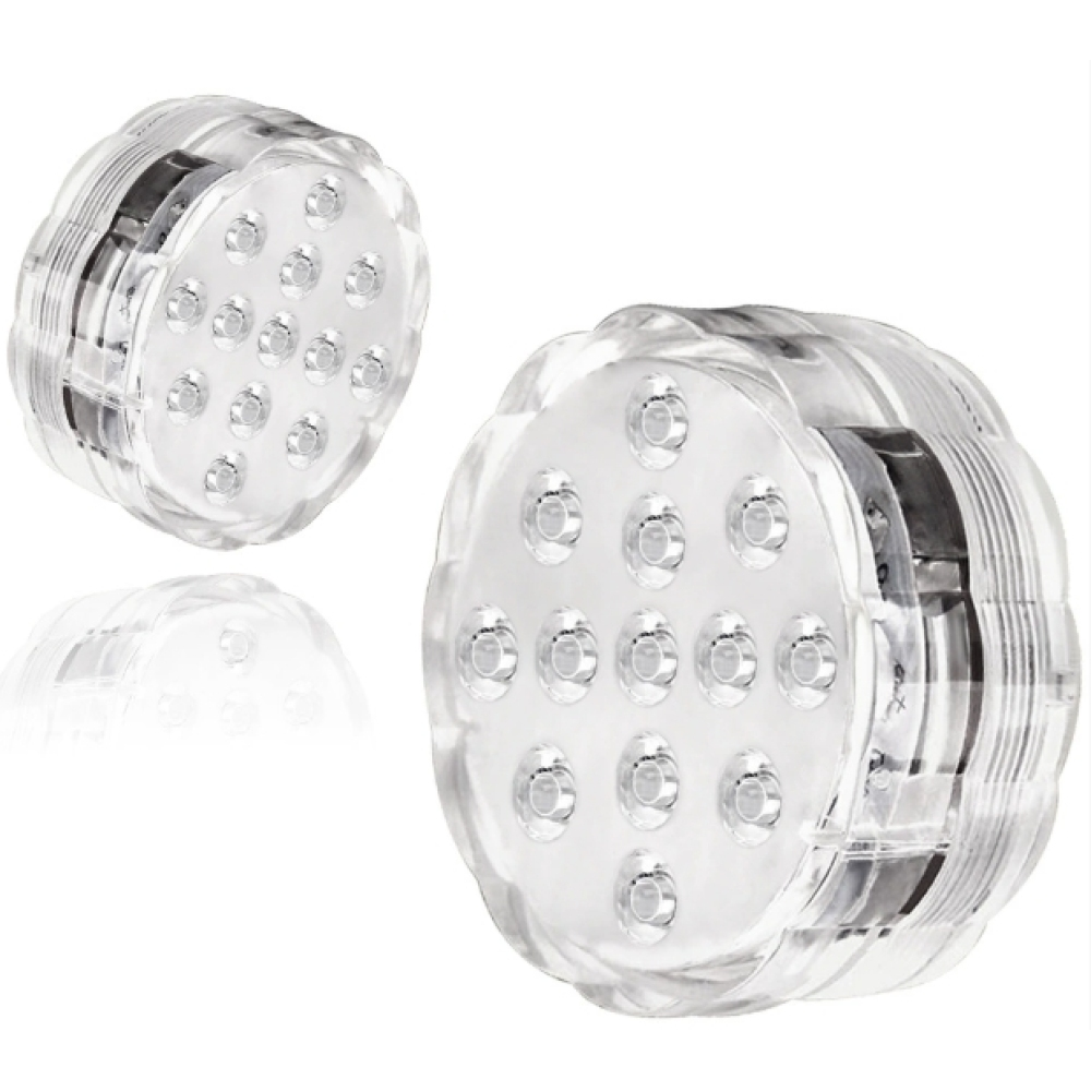 Zwei klare, kreisförmige Lichter mit mehreren LEDs. Sie sind eingeschaltet und sehen transparent aus.