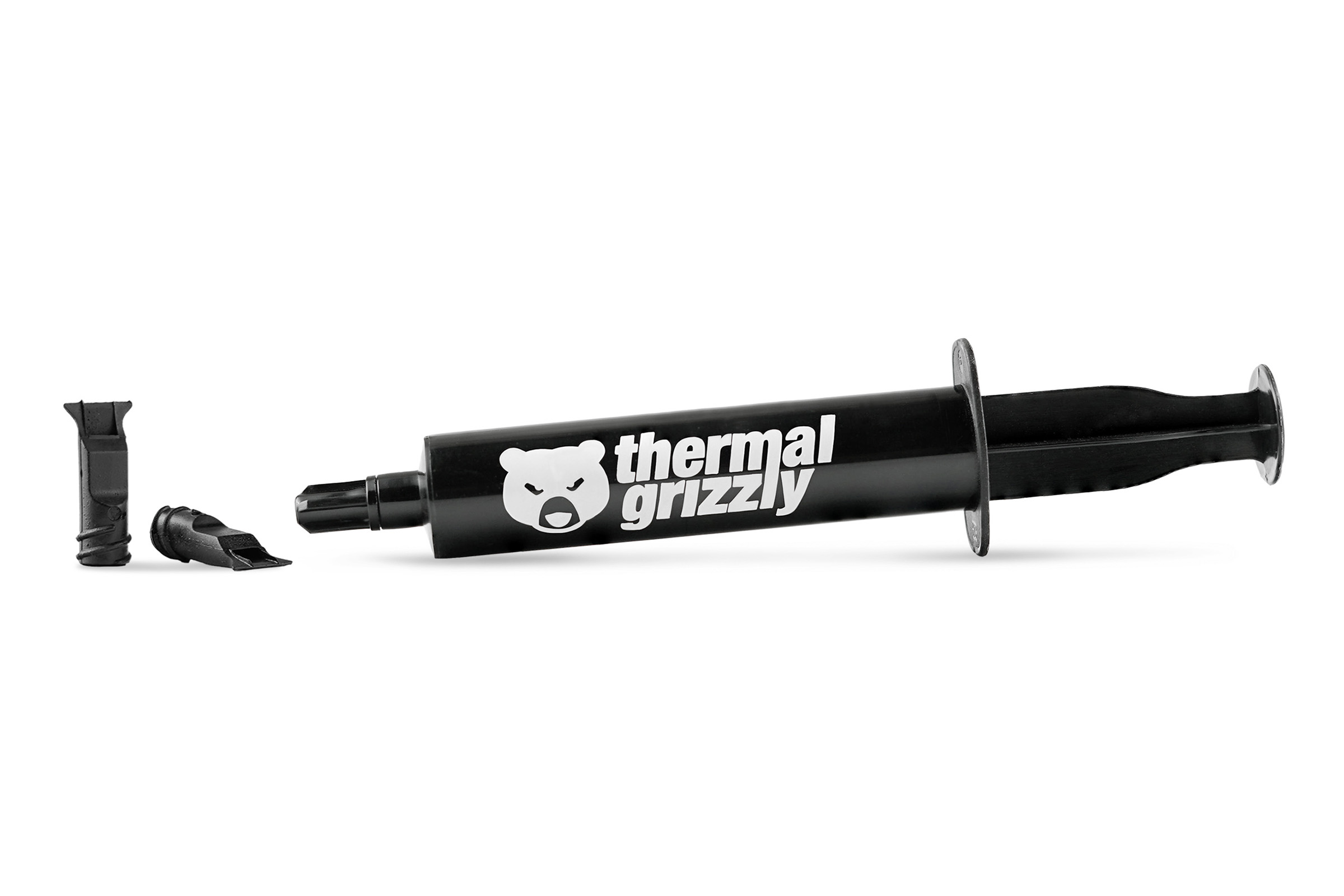 Una siringa nera con il logo Thermal Grizzly e due puntali neri accanto su sfondo bianco.