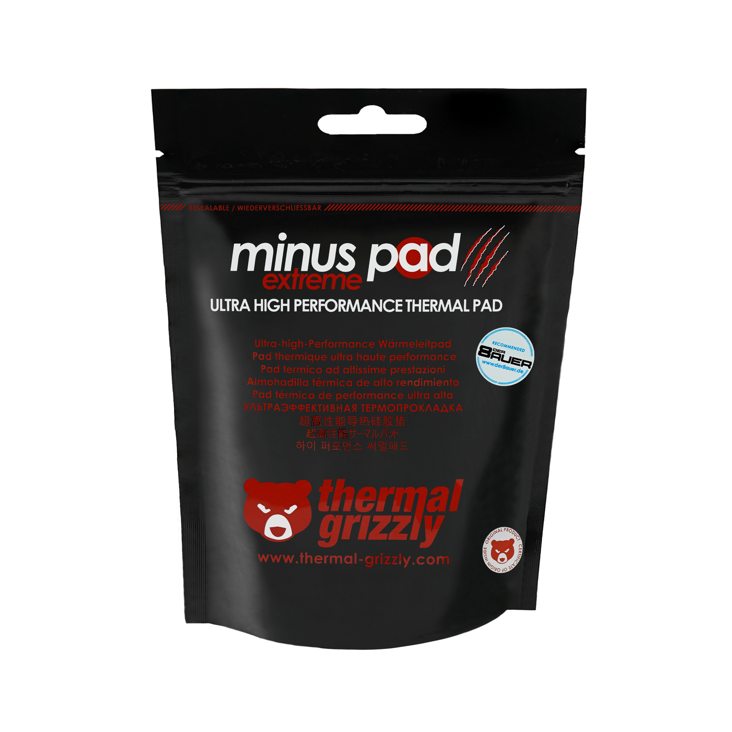 Eine schwarze Verpackung mit Text und einem Wärmeleitpad. Die Verpackung hat das Thermal Grizzly Logo und Text in mehreren Sprachen.