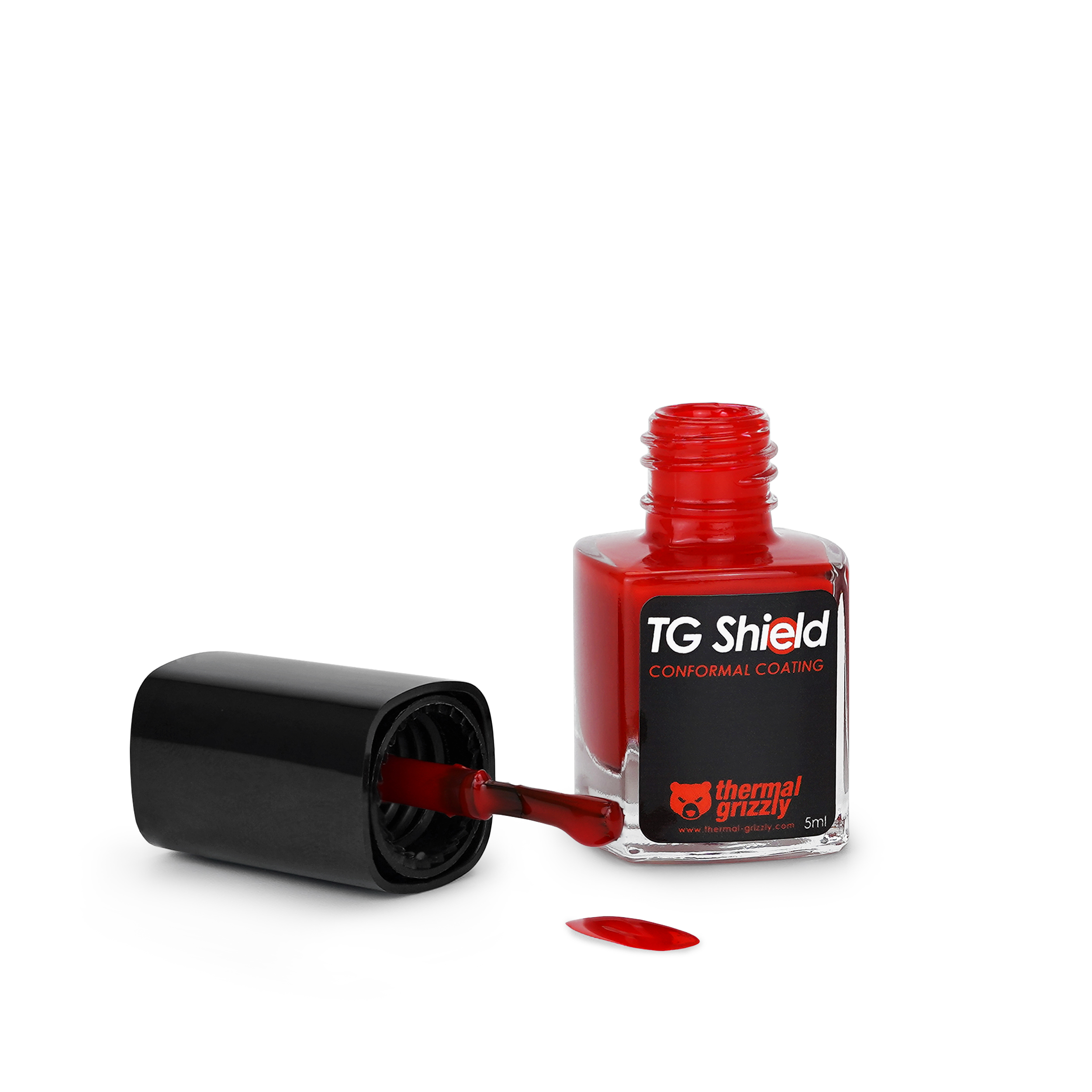 Eine Flasche rotes TG Shield, Pinsel aus der Flasche und ein Tropfen Farbe.