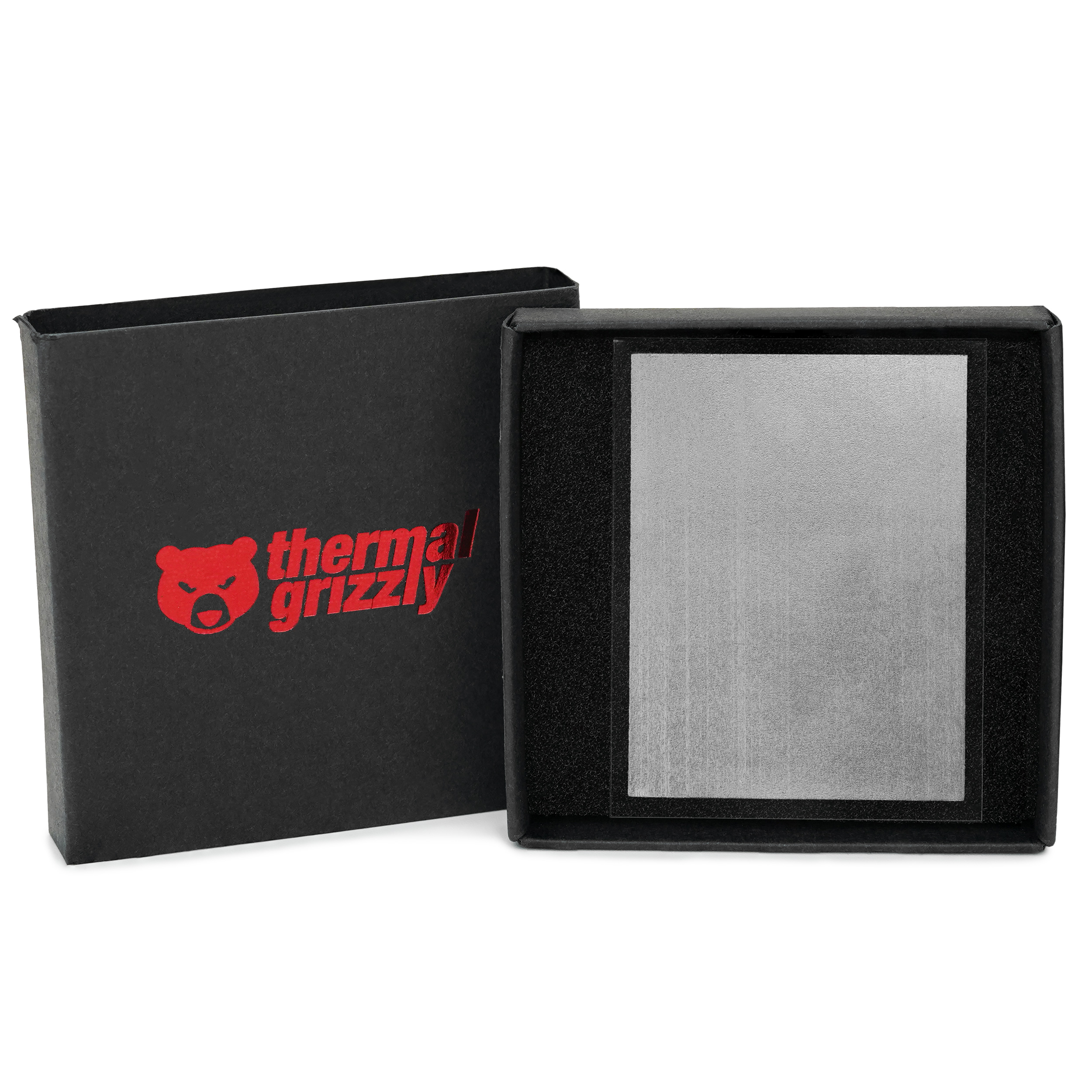 Una scatola nera con un prodotto Thermal Grizzly all'interno e un logo.