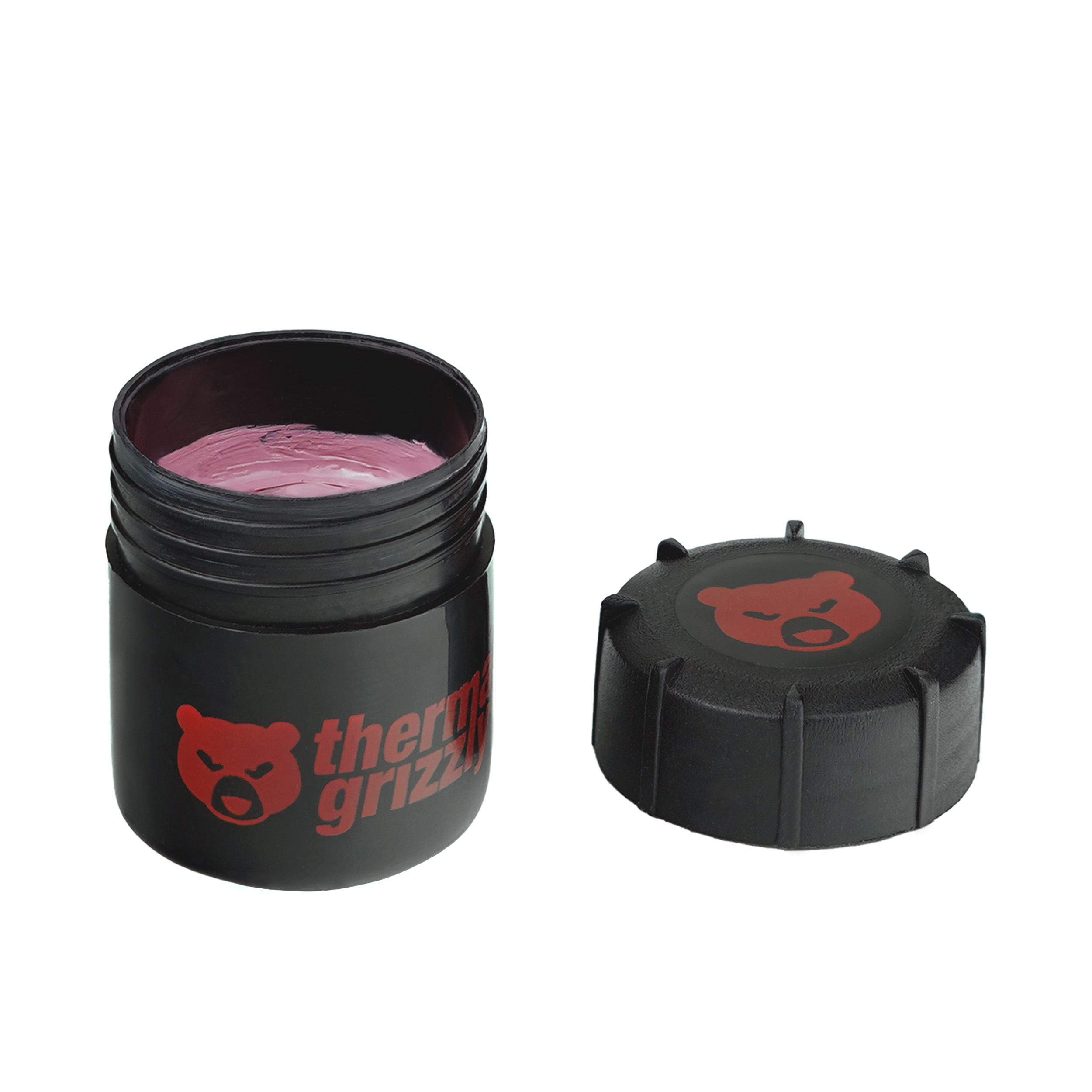 Schwarzes Glas mit rosa Paste und rotem Deckel. Weißer Hintergrund.
