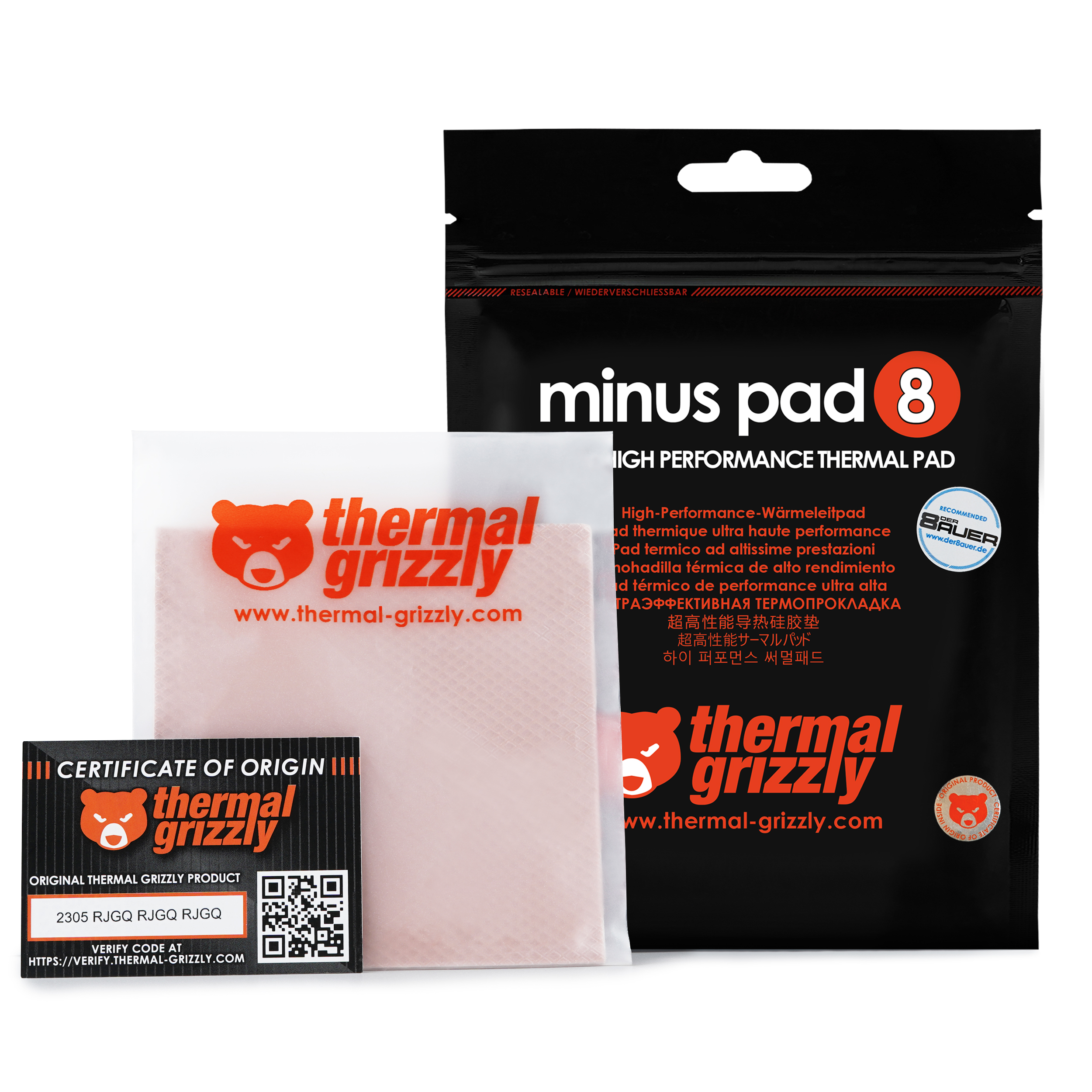 Pembe termal ped, kutu, orijinallik sertifikası ve Thermal Grizzly logolu bir çanta.