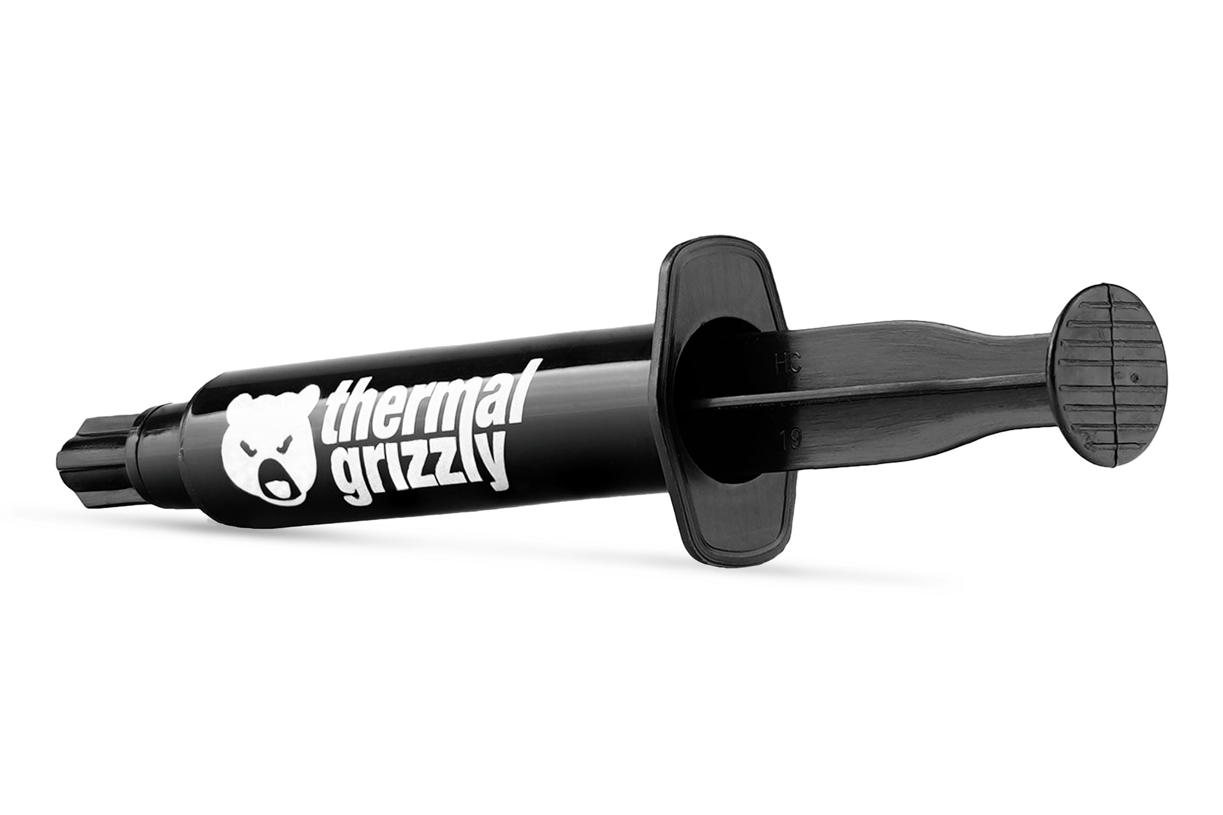 Eine Thermal Grizzly Spritze mit schwarzer Tube und Applikator, das Branding ist sichtbar.