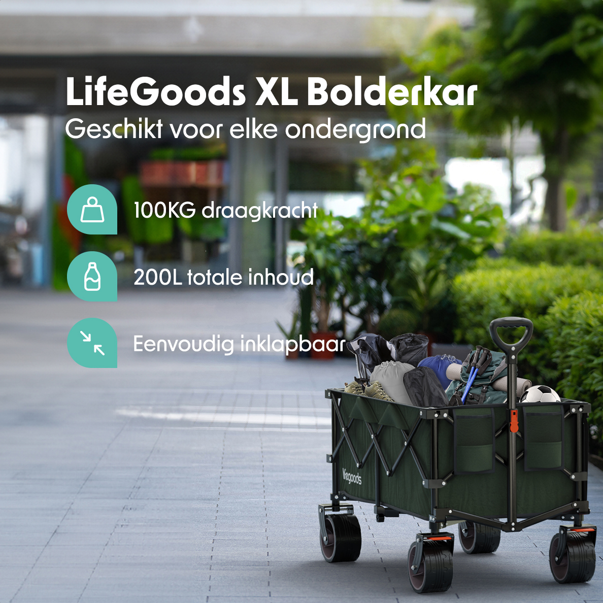 A green LifeGoods XL Bolderkar wagon is full of items, 100KG load capacity, and folds easily. Trees in the background.
