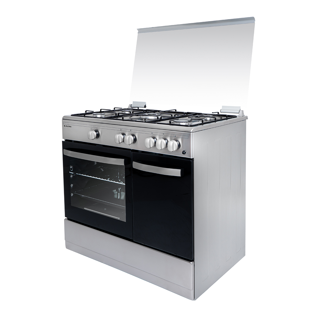 Una estufa plateada con cuatro quemadores, un horno y una cubierta transparente.