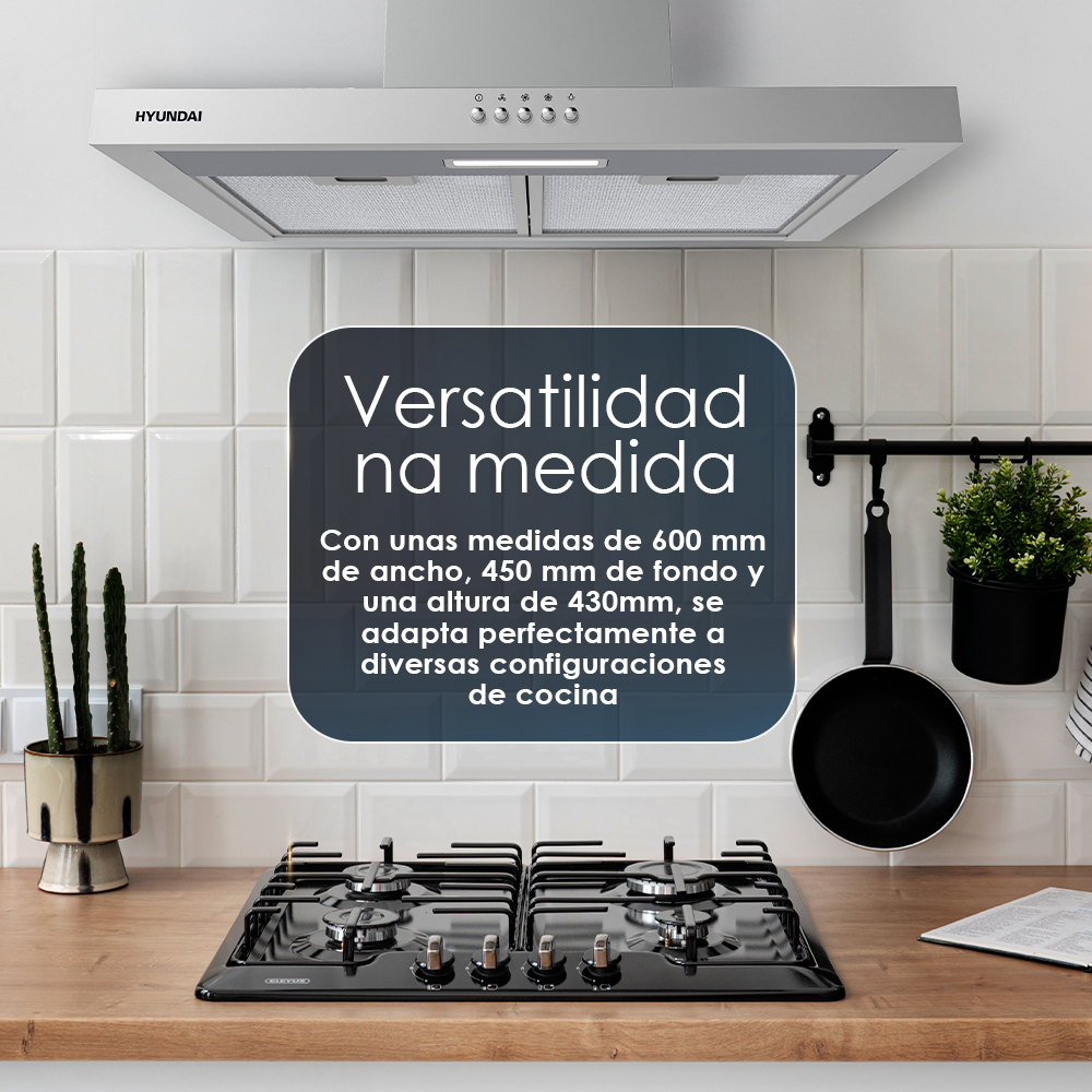 Una escena de cocina con una placa de gas, una campana extractora y texto sobre versatilidad en una encimera de madera.