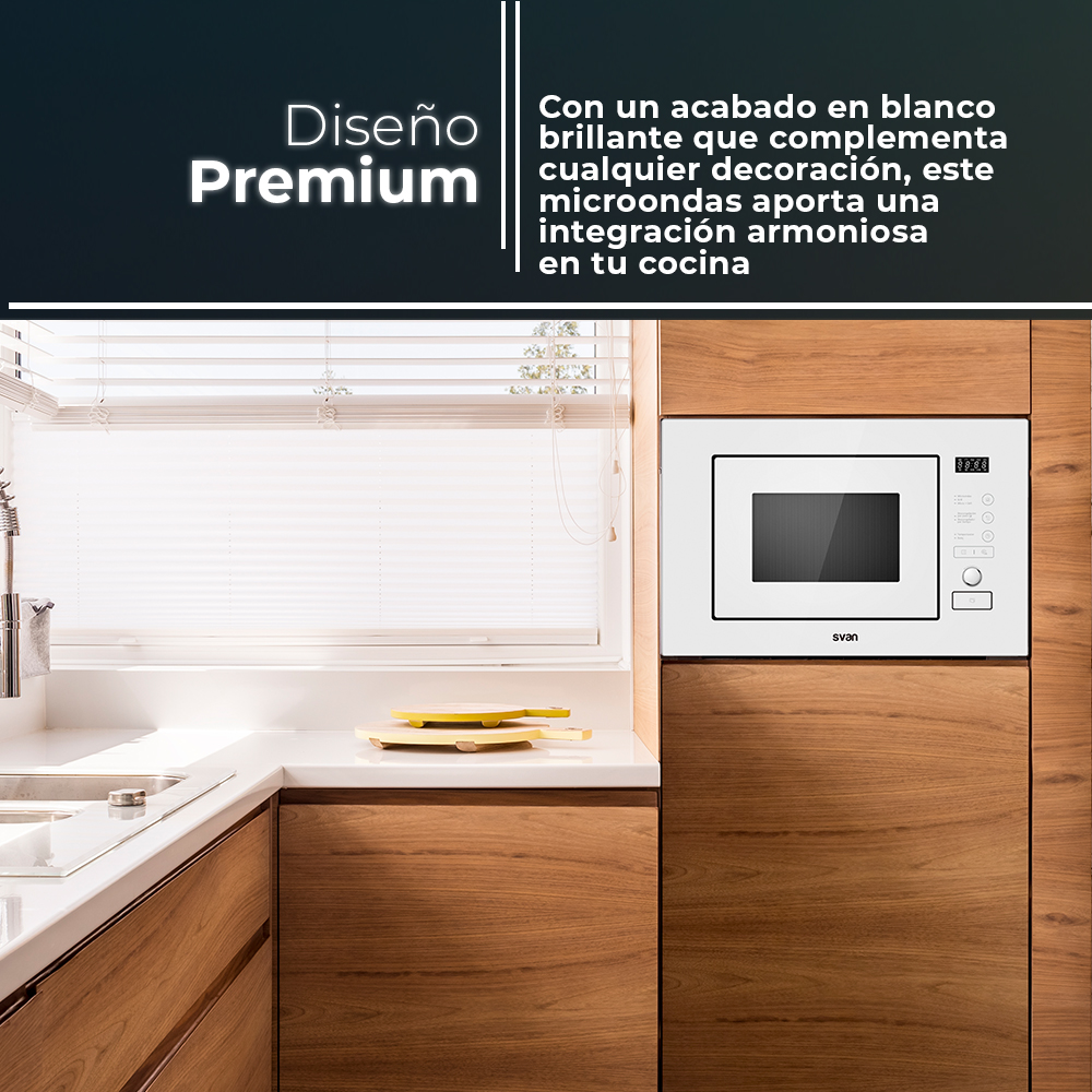 Un microondas blanco integrado en un armario de madera, mostrando un diseño de cocina moderno.
