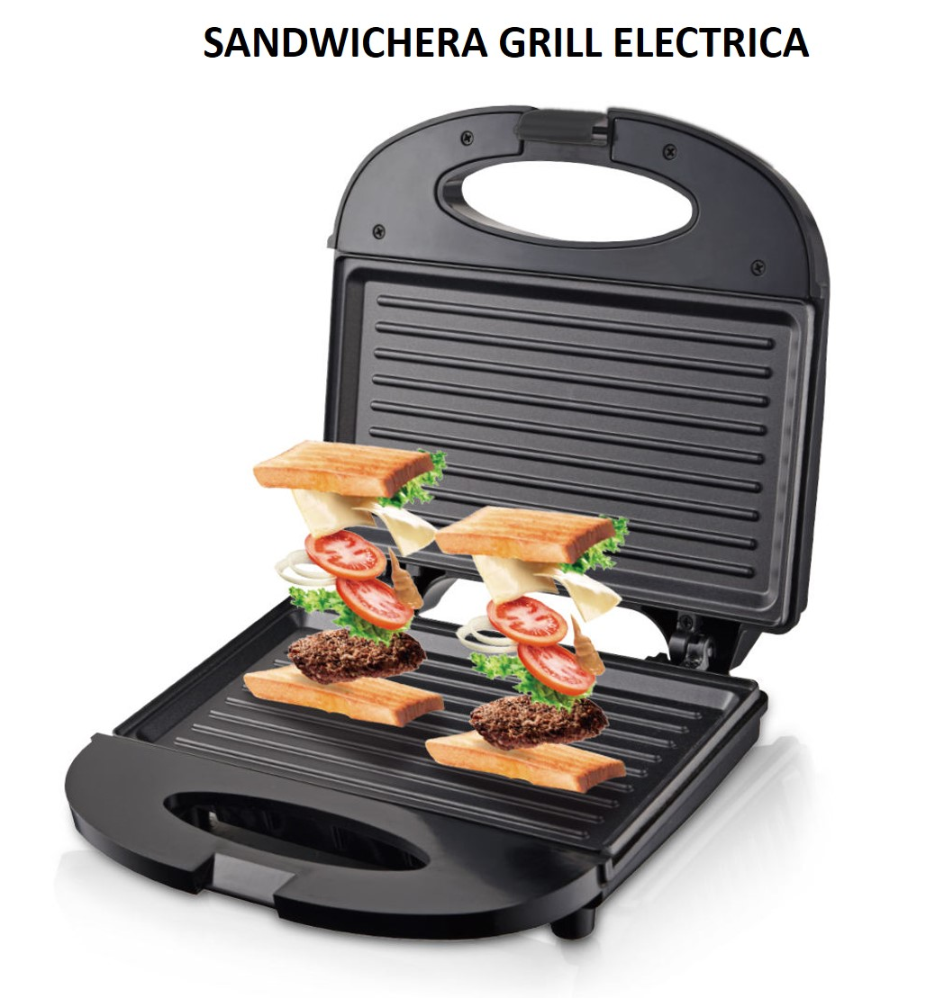 Sandwichera negra abierta con partes de sándwich visibles dentro. Superficie negra.
