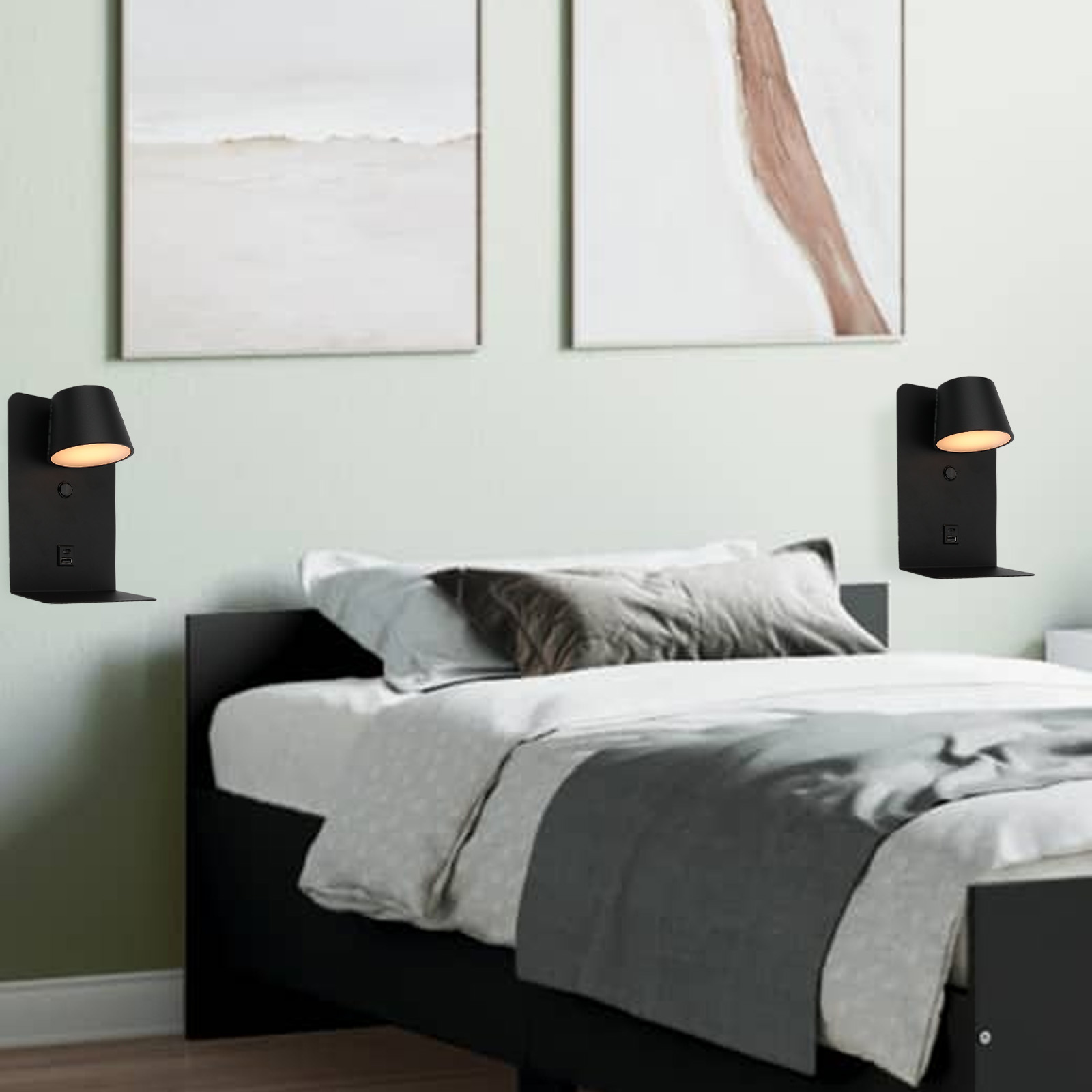 Dos lámparas de pared negras con luces a ambos lados de una cama con ropa de cama gris.