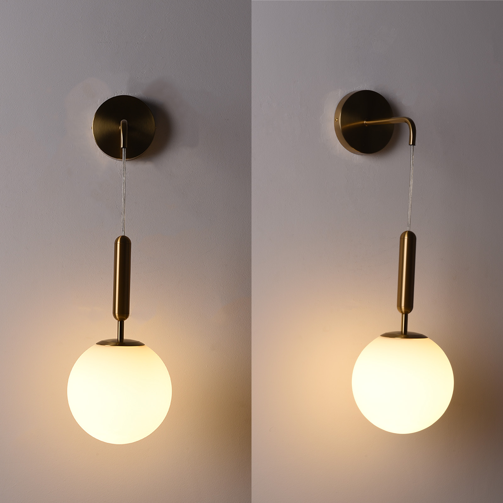 Dos lámparas de pared. Cada una tiene un globo blanco y brazo dorado, en pared gris.