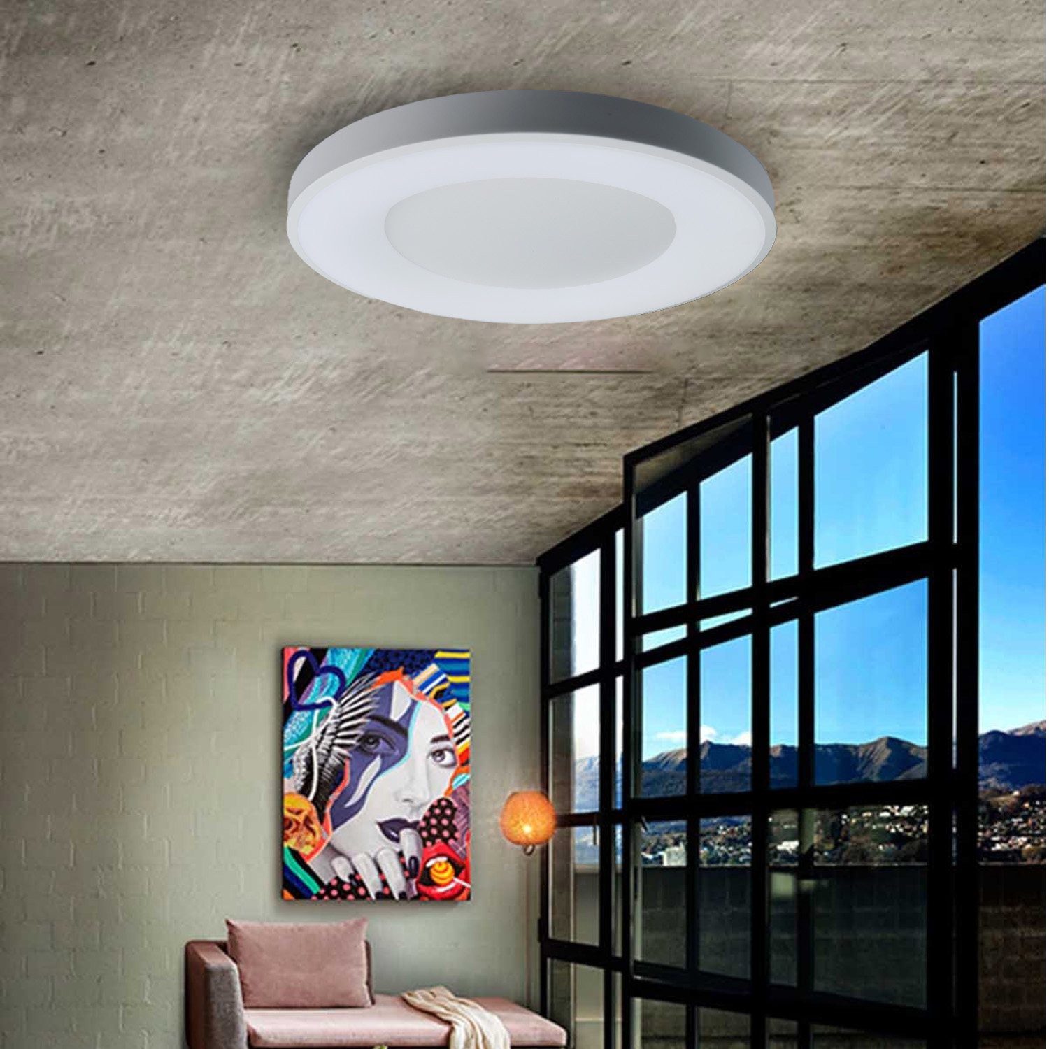 Luz de techo en una habitación moderna, con una pintura y una ventana con marco negro.