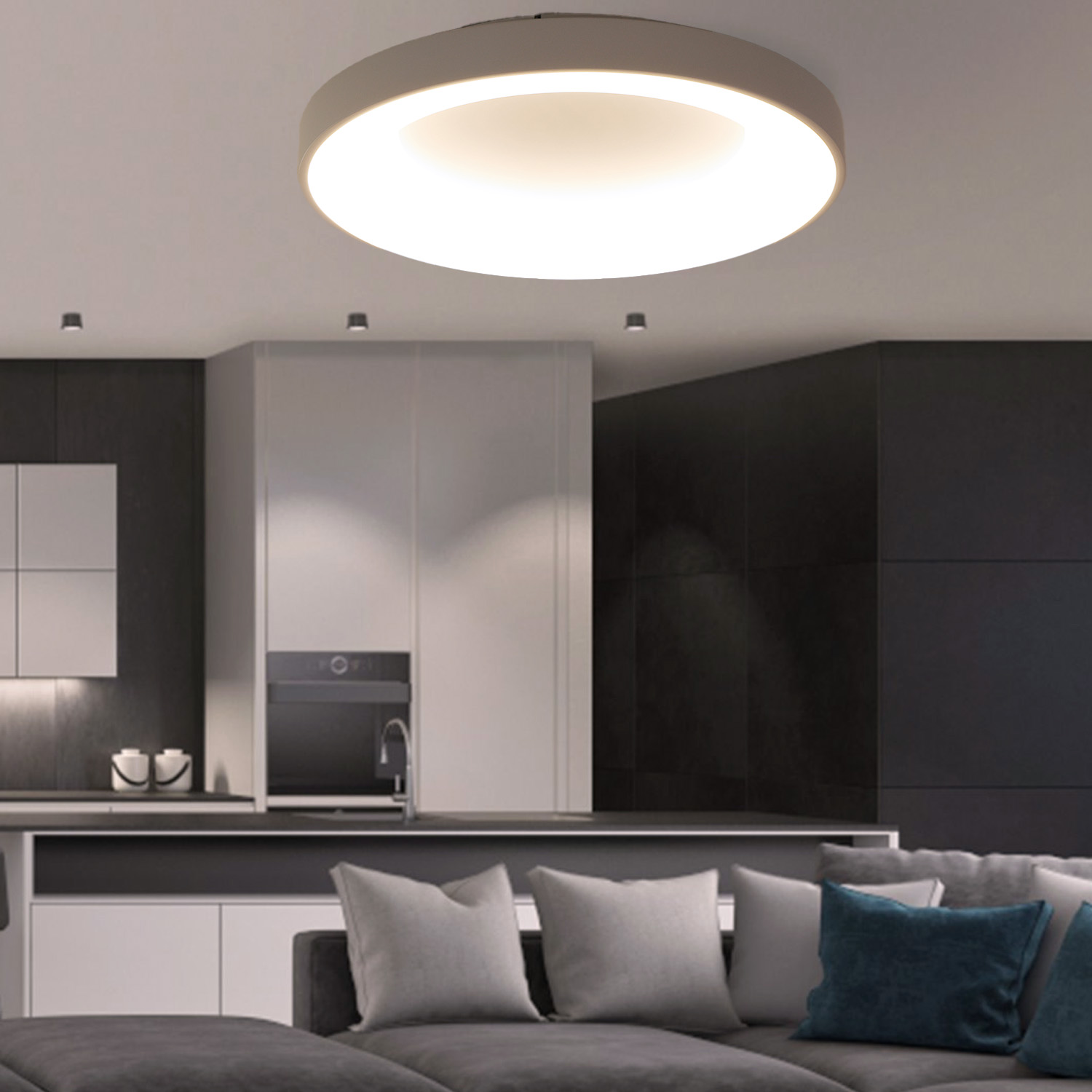 Salón moderno con luz de techo, sofá y esquema de color neutral.