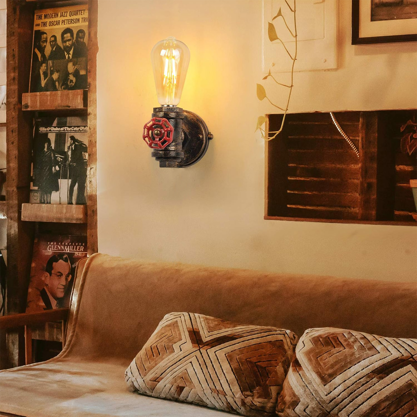 Lámpara de pared de diseño vintage, con bombilla visible y válvula roja.