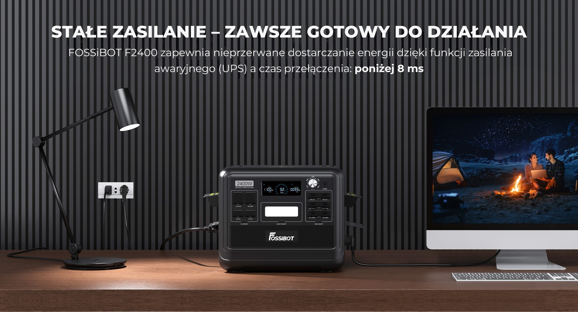 Elektrownia FOSSIBOT na biurku. Ma wiele portów i ekran. Monitor pokazuje parę. Tekst o elektrowni.